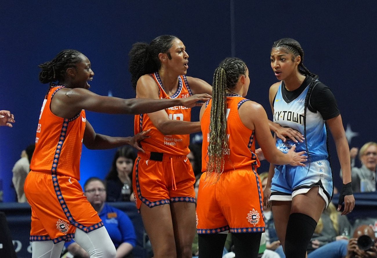 Chicago Sky forward Angel Reese (5) and Connecticut Sun guard Bria Hartley (14) have words in the second half at Mohegan Sun Arena.