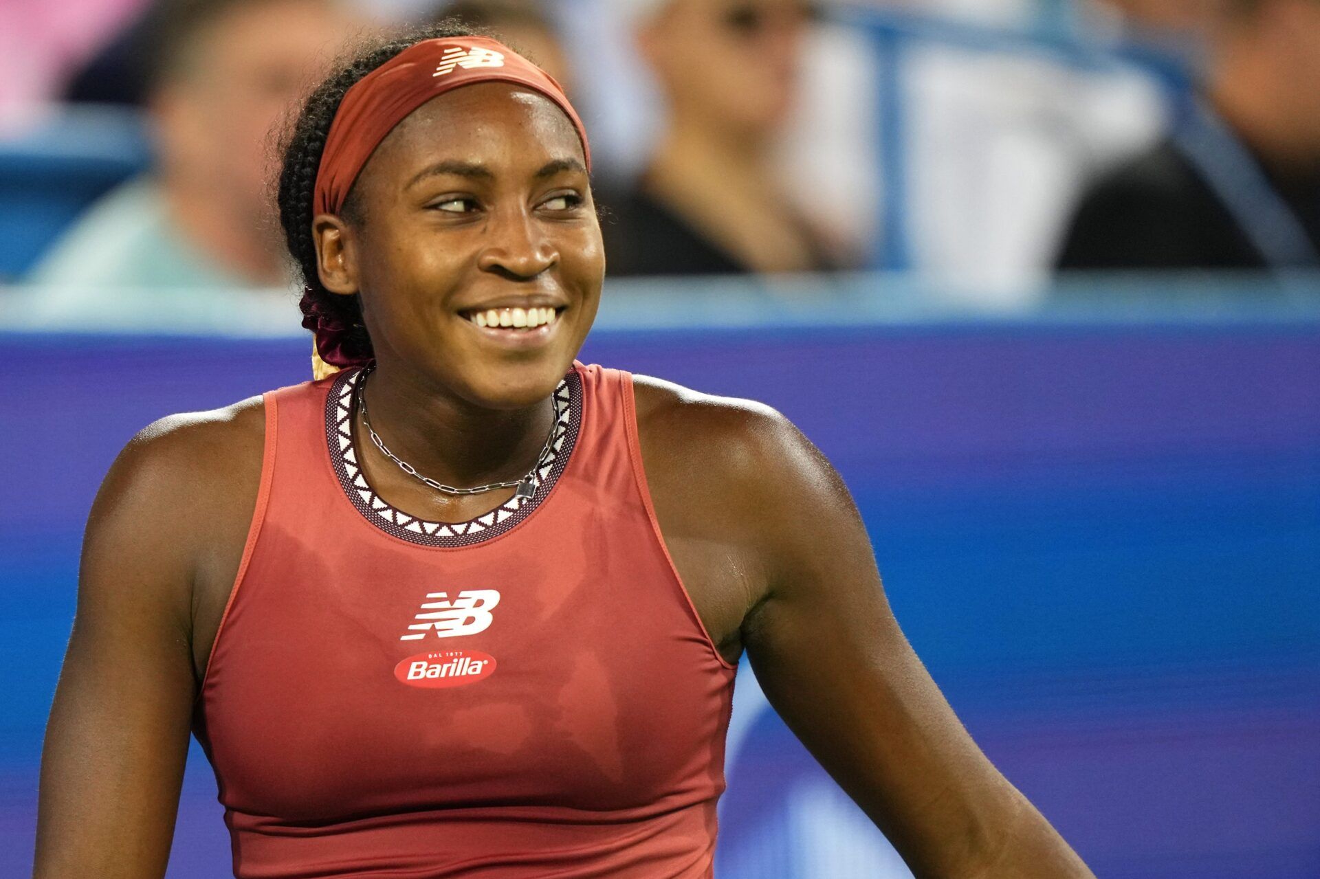 Coco Gauff, of the United States, smiles after a winning point against Mayar Sherif, of Egypt, during their match of the Western & Southern Open tennis tournament, Wednesday, Aug. 16, 2023, at the Lindner Family Tennis Center in Mason, Ohio.