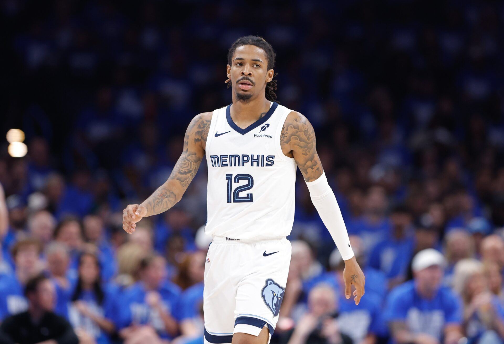 Memphis Grizzlies guard Ja Morant (12) walks down the court in the third quarter of game two of first round for the 2024 NBA Playoffs against the Oklahoma City Thunder at Paycom Center.