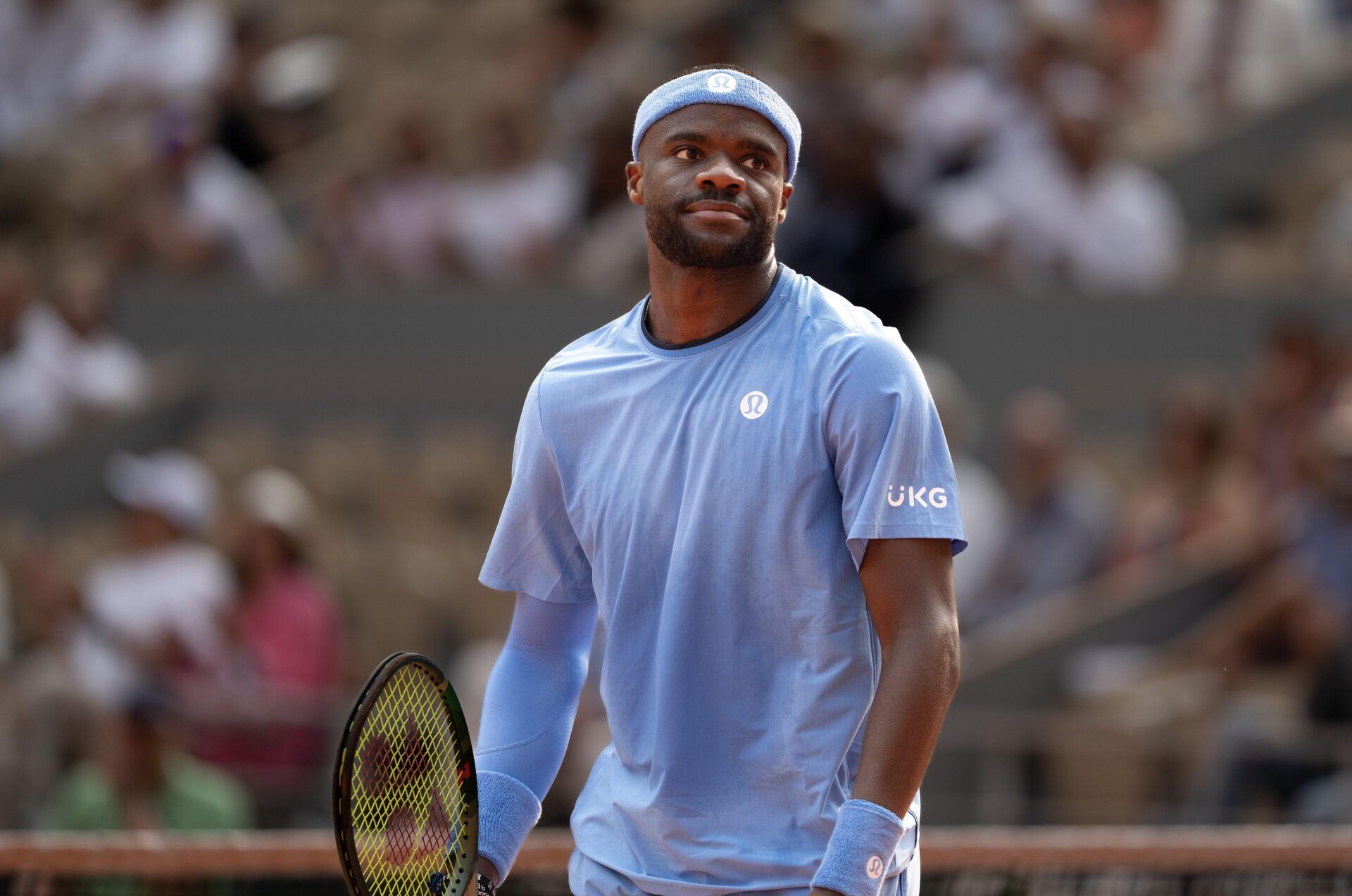 Frances Tiafoe of the United States reacts to a point during his match  against Lorenzo Musetti of Italy on day 10 at Roland Garros Stadium.
