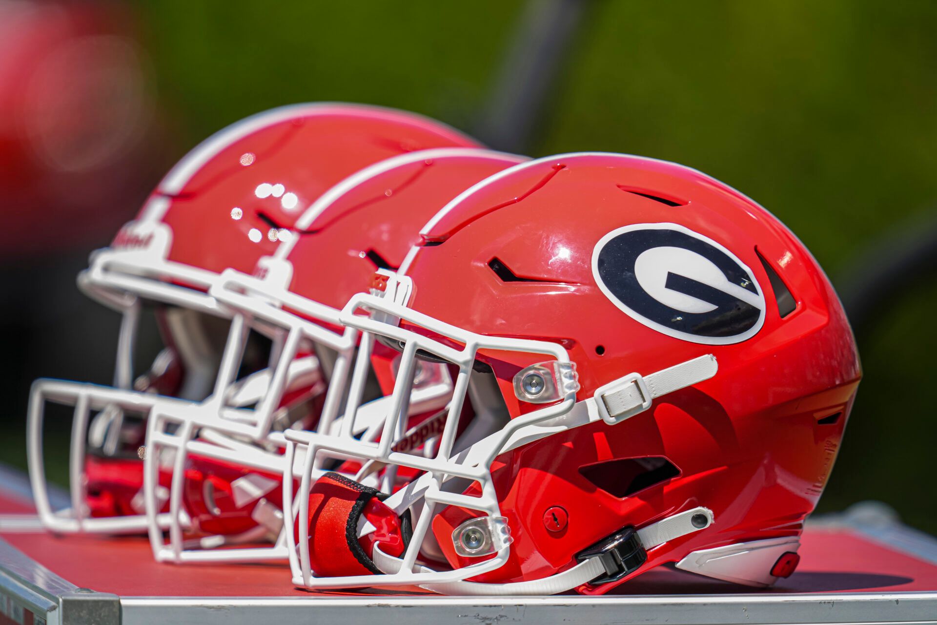 Georgia Bulldogs helmets on the bench during the Georgia Spring game at Sanford Stadium.