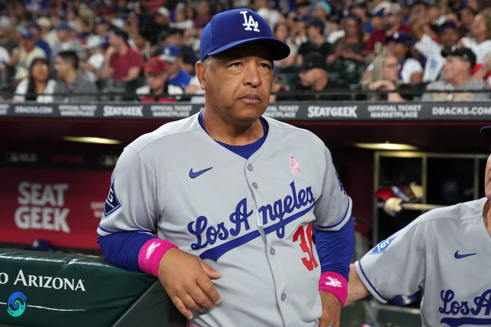 Los Angeles Dodgers manager Dave Roberts (30) gets ready for a game against the Arizona Diamondbacks at Chase Field.
