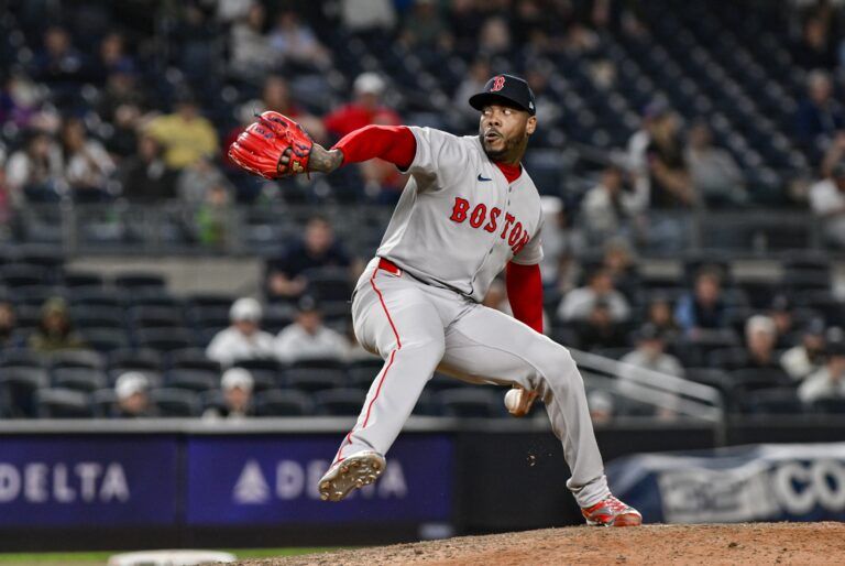 Boston Red Sox pitcher Aroldis Chapman (44) pitches against the New York Yankees during the ninth inning at Yankee Stadium.