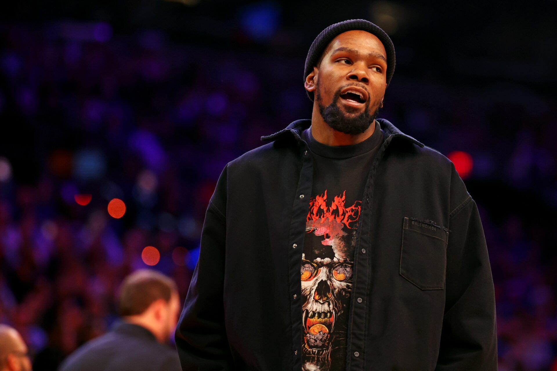 Phoenix Suns forward Kevin Durant looks on from the sidelines during the game between the Phoenix Suns and the New York Knicks at Footprint Center.
