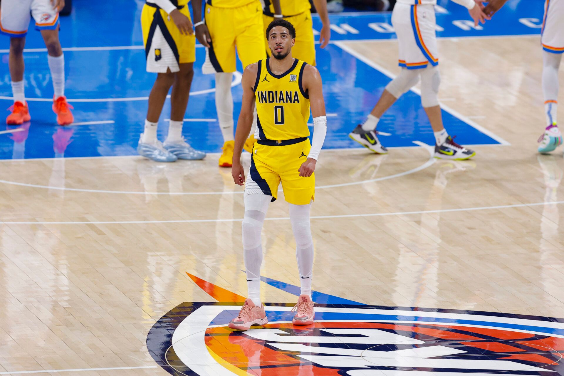Indiana Pacers guard Tyrese Haliburton (0) walks back to the team bench in the first quarter against the Oklahoma City Thunder during game five of the 2025 NBA Finals at Paycom Center.
