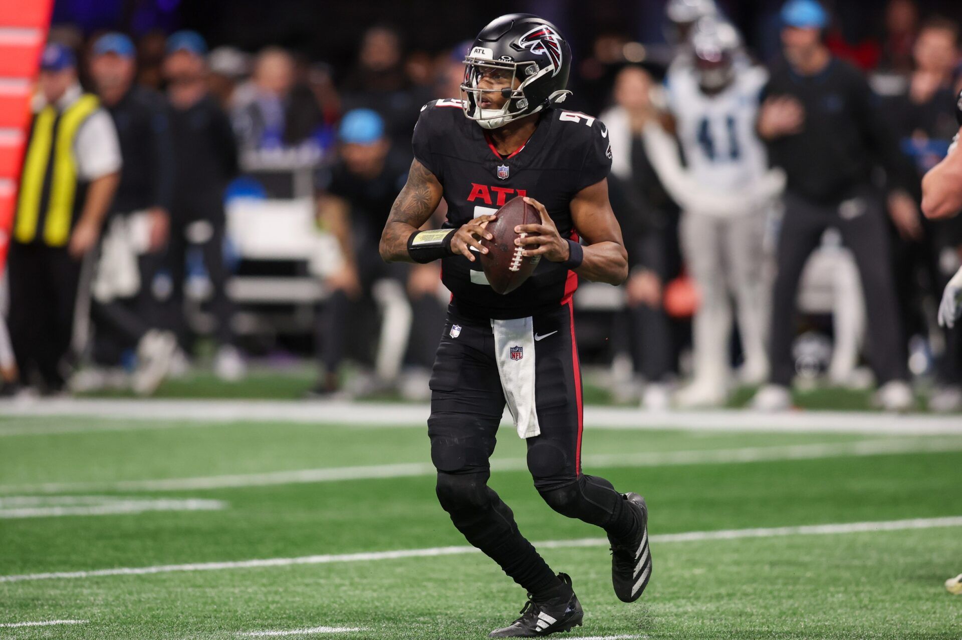 Atlanta Falcons quarterback Michael Penix Jr. (9) looks to throw against the Carolina Panthers in the second quarter at Mercedes-Benz Stadium.