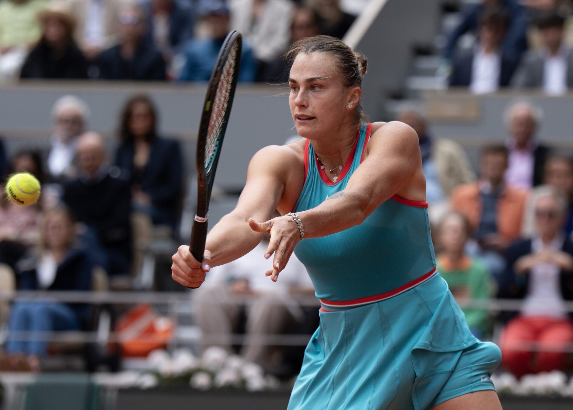 Aryna Sabalenka returns a shot during the womenÕs singles final against Coco Gauff of the United States on day 14 at Roland Garros Stadium.