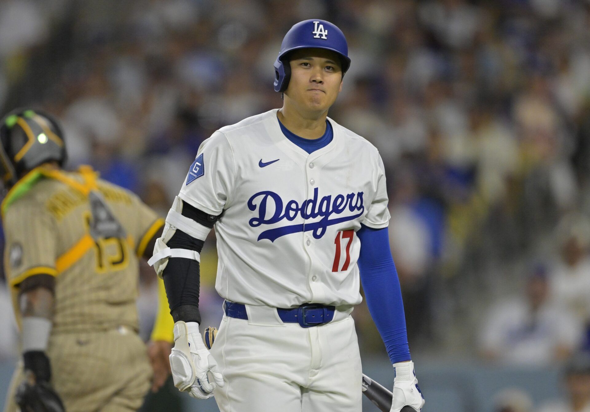 Los Angeles Dodgers designated hitter Shohei Ohtani (17) reacts after striking out in the sixth inning against the San Diego Padres at Dodger Stadium.