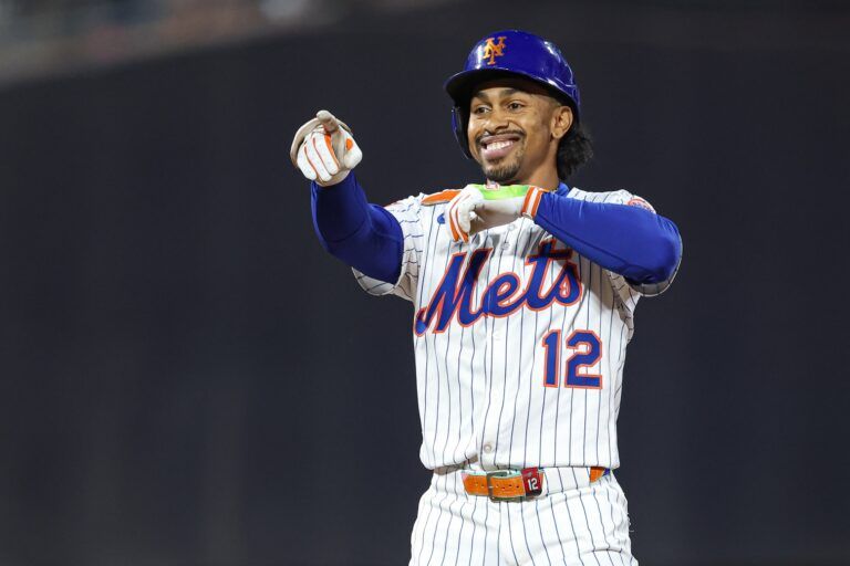 New York Mets shortstop Francisco Lindor (12) reacts after hitting a double during the sixth inning against the Chicago White Sox at Citi Field.