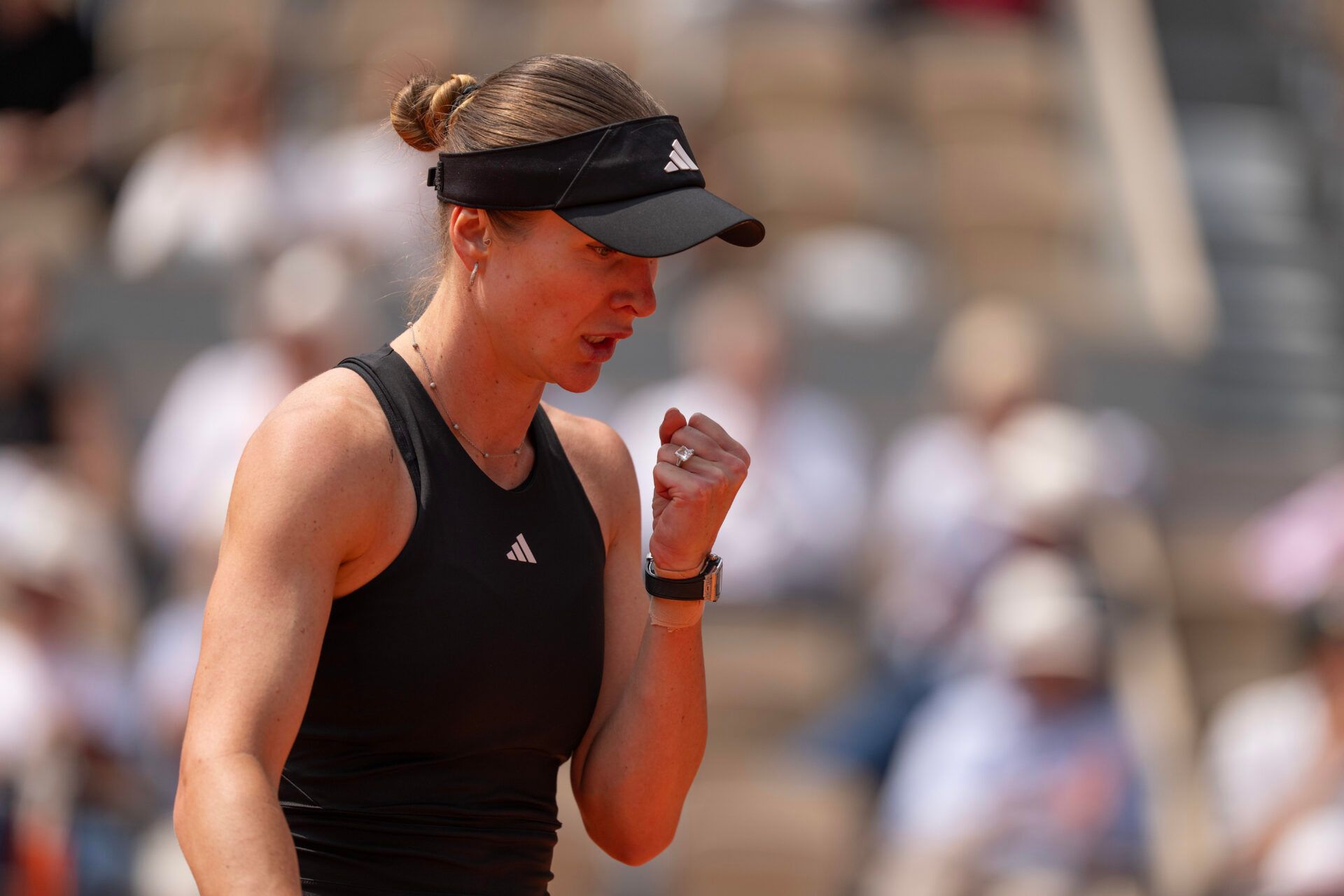 Elina Svitolina of Ukraine reacts to a point during her match against Iga Swiatek of Poland on day 10 at Roland Garros Stadium.