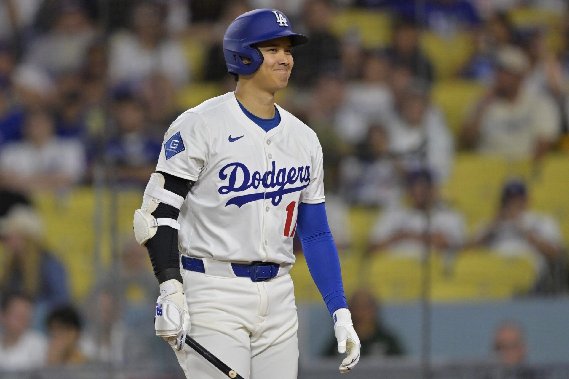 Los Angeles Dodgers designated hitter Shohei Ohtani (17) reacts to an inside pitch in the eighth inning against the San Diego Padres at Dodger Stadium.