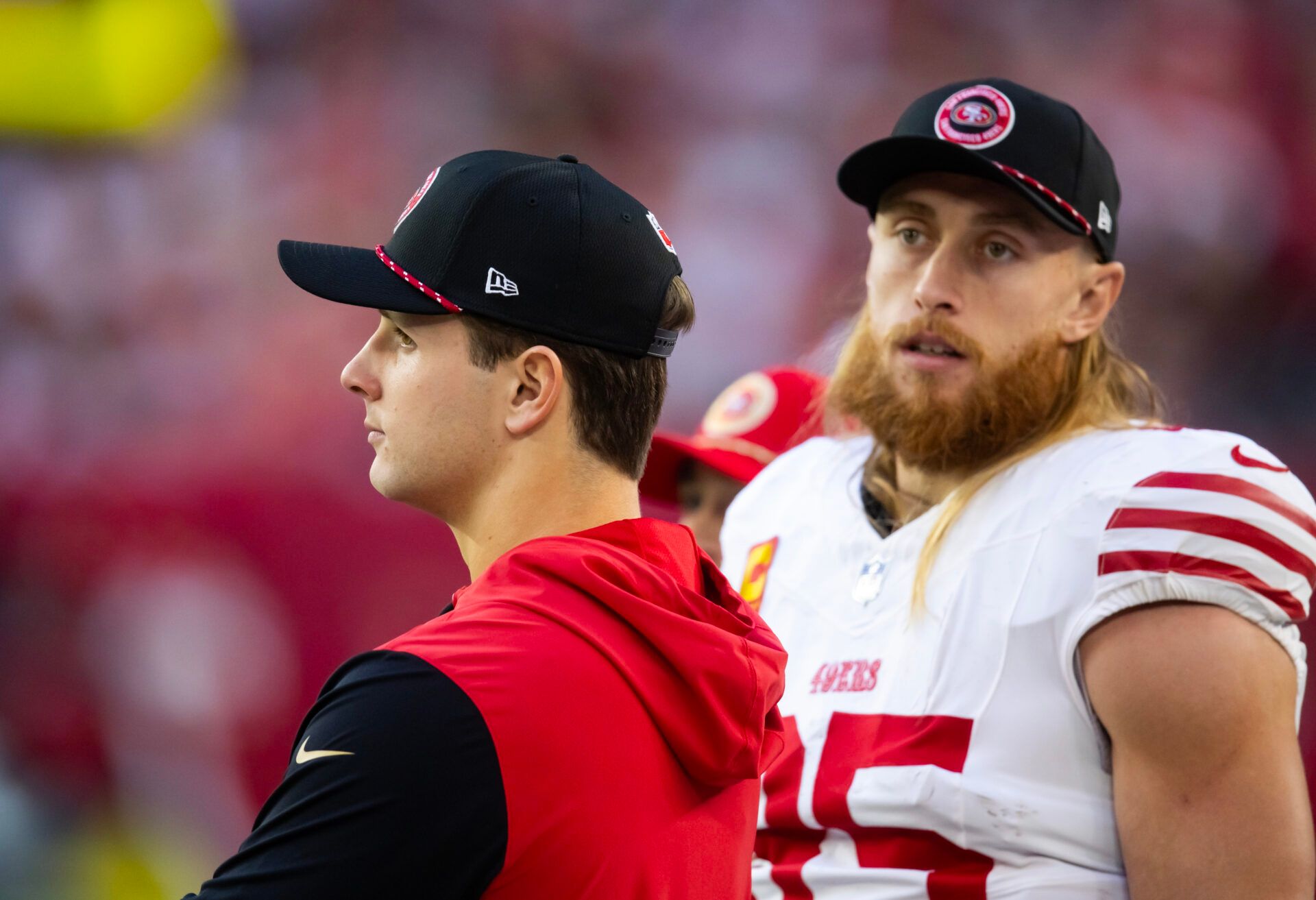 San Francisco 49ers quarterback Brock Purdy (left) with tight end George Kittle (85) against the Arizona Cardinals at State Farm Stadium.