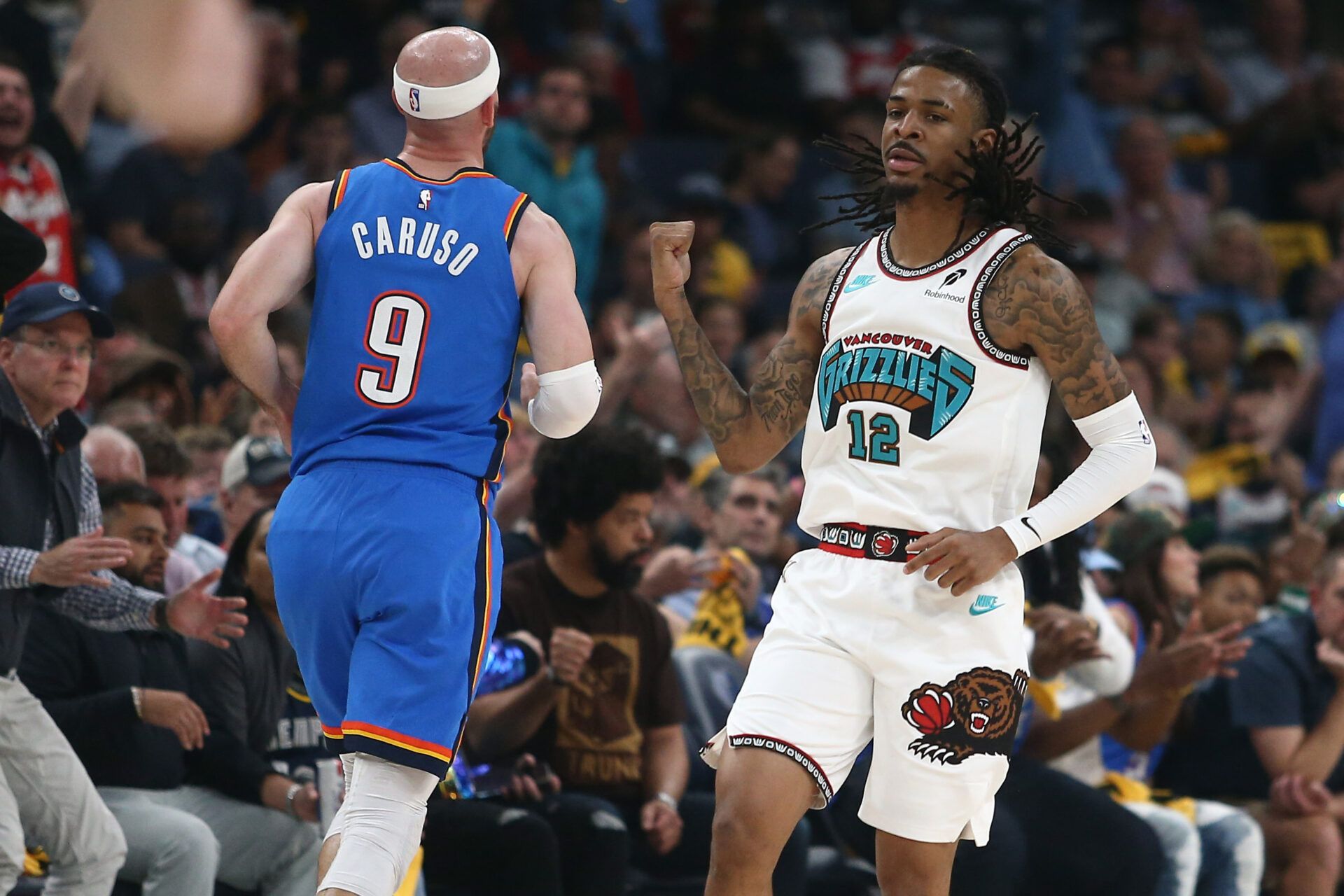Memphis Grizzlies guard Ja Morant (12) reacts after a three point basket during the second quarter against the Oklahoma City Thunder during game three for the first round of the 2024 NBA Playoffs at FedExForum.