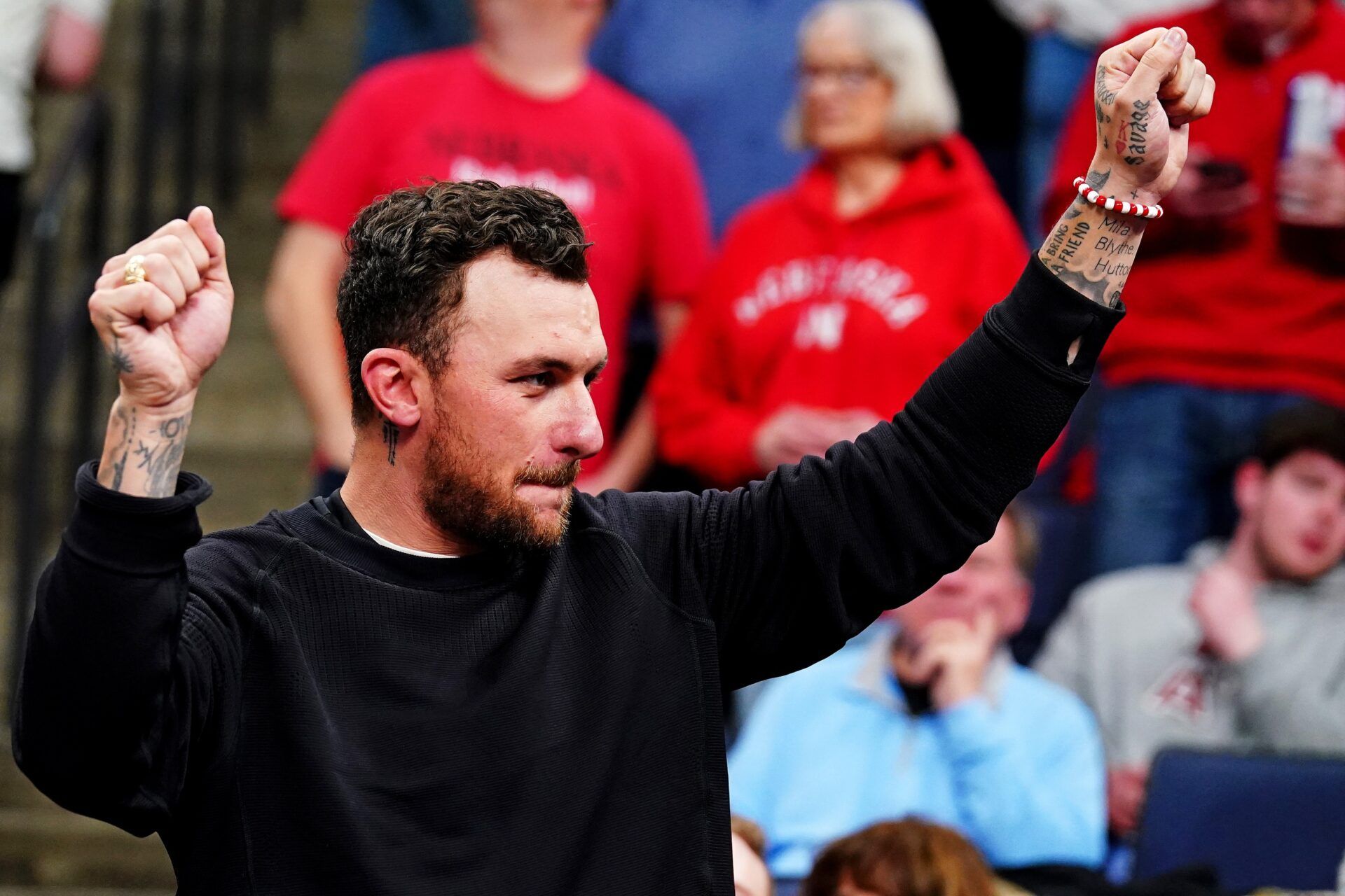 Texas A&M Aggies former quarterback Johnny Manziel watches the between the Texas A&M Aggies and the Nebraska Cornhuskers in the first round of the 2024 NCAA Tournament at FedExForum.