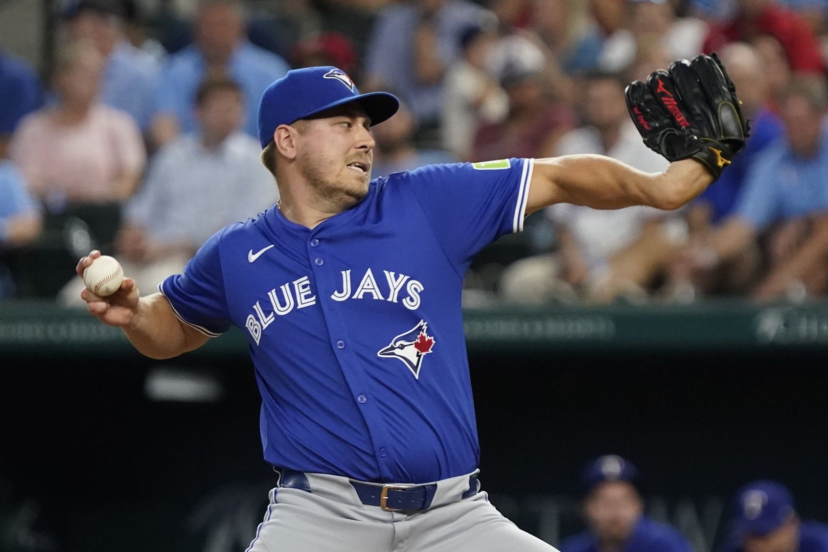 Toronto Blue Jays pitcher Erik Swanson (50) throws to the plate during the eighth inning against the Texas Rangers at Globe Life Field.