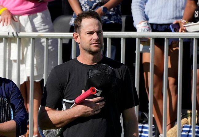 Kim Clijsters and Andy Roddick observe The Star-Spangled Banner before the Mixed-Doubles Exhibition Match at the Breakers Friday March 21, 2025 in Palm Beach. The event celebrating the debut of the new tennis and racquet facilities benefits First Serve USA.