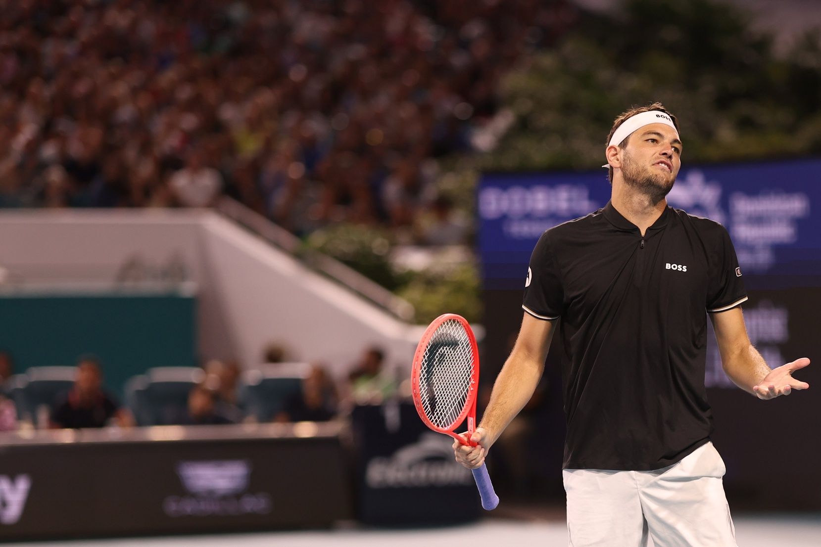 Taylor Fritz (USA) reacts after missing a shot against Matteo Berrettini (ITA)(not pictured) in a men's singles quarterfinal on day ten of the Miami Open at Hard Rock Stadium.