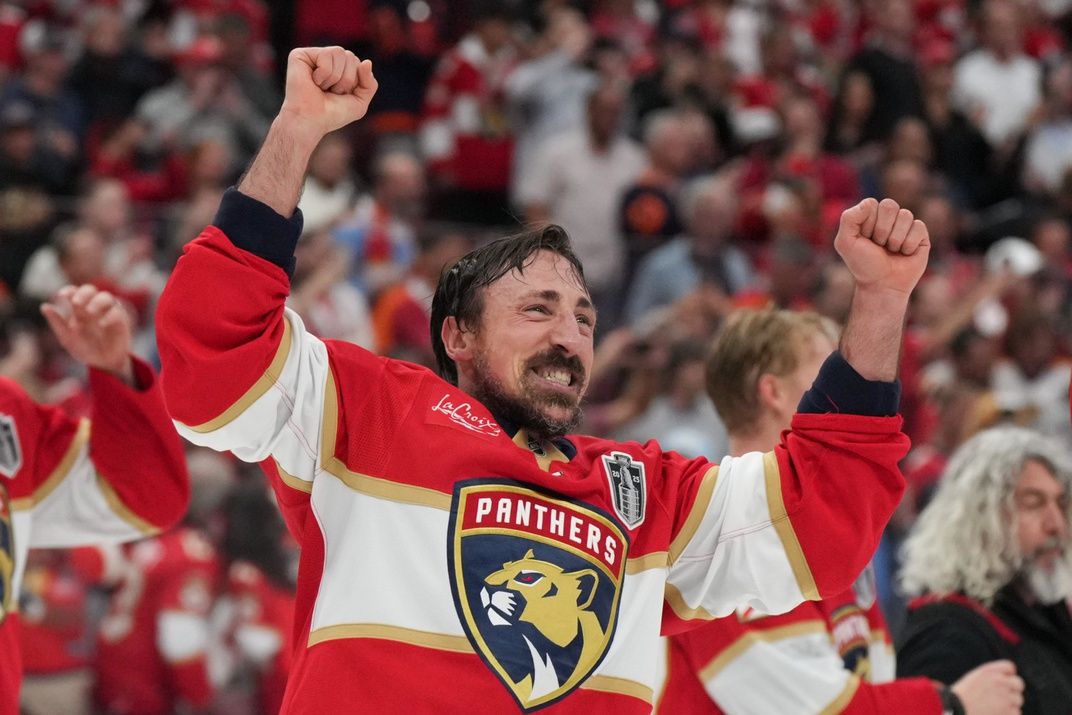 Florida Panthers center Brad Marchand (63) celebrates with his teamates after winning game six of the 2025 Stanley Cup Final against the Edmonton Oilers at Amerant Bank Arena.
