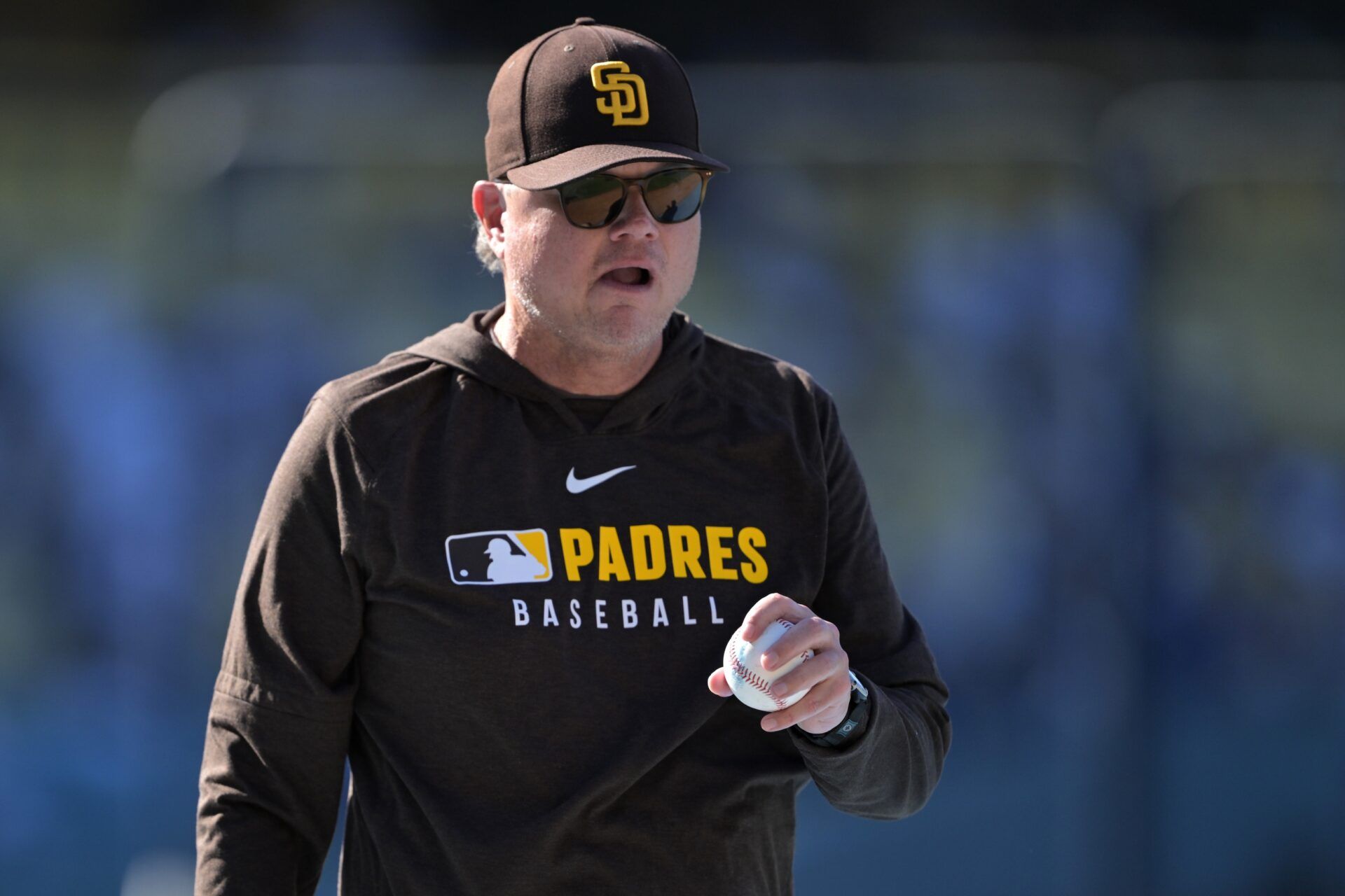 San Diego Padres manager Mike Shildt (8) warms up players prior to the game against the Los Angeles Dodgers at Dodger Stadium.