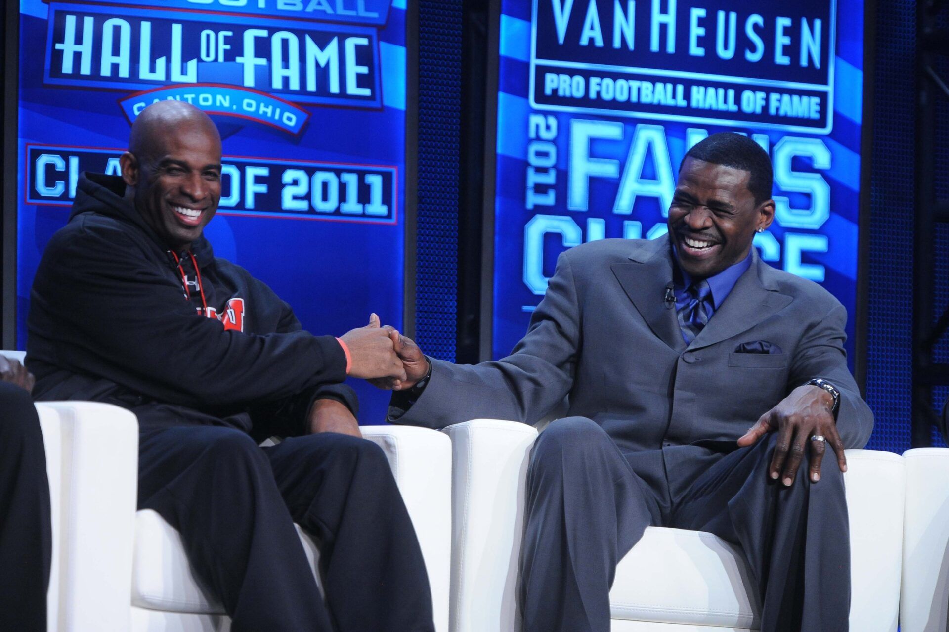 Deion Sanders (left) and Michael Irvin at the 2011 Pro Football Hall of Fame announcement show at the Super Bowl XLV media center at the International Conference and Exposition Center.