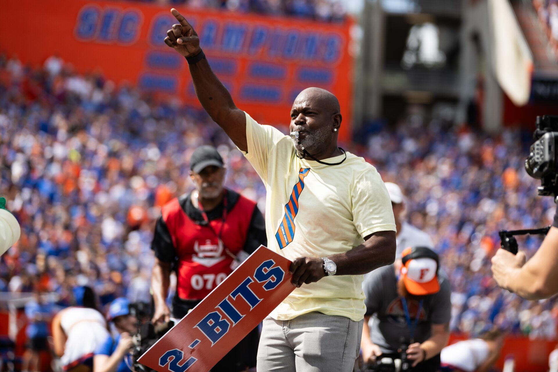 Former Florida Gators running back Emmitt Smith performs as honorary “Mr. Two-Bits” before a game against the Texas A&M Aggies at Ben Hill Griffin Stadium.