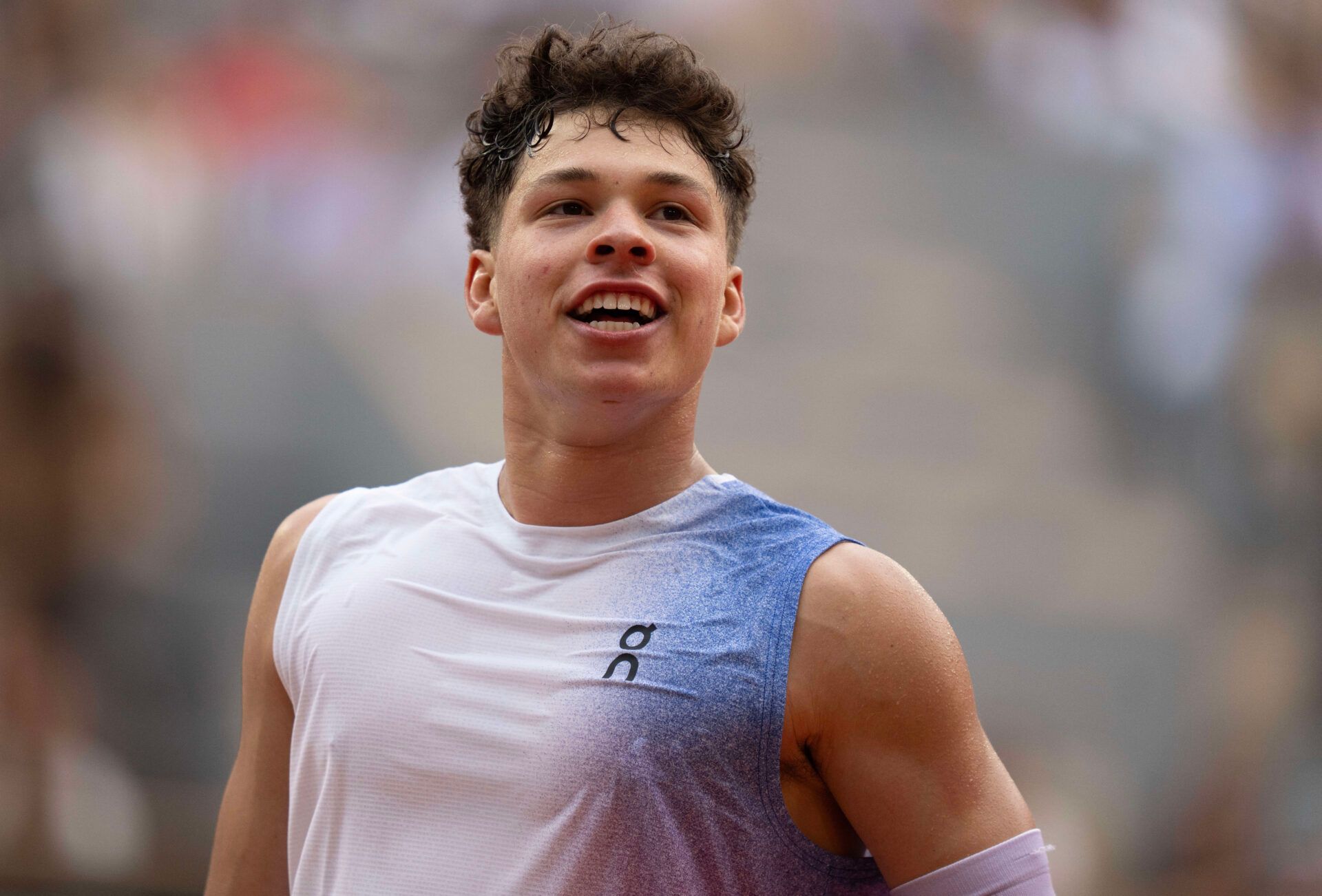 Ben Shelton of the United States reacts to a point during his match against Carlos Alcaraz of Spain on day eight at Roland Garros Stadium.