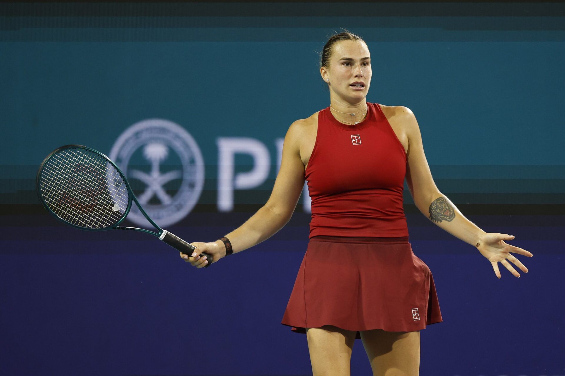 Aryna Sabalenka reacts after winning a point against Zheng Qinwen (CHN)(not pictured) on day eight of the Miami Open at Hard Rock Stadium.