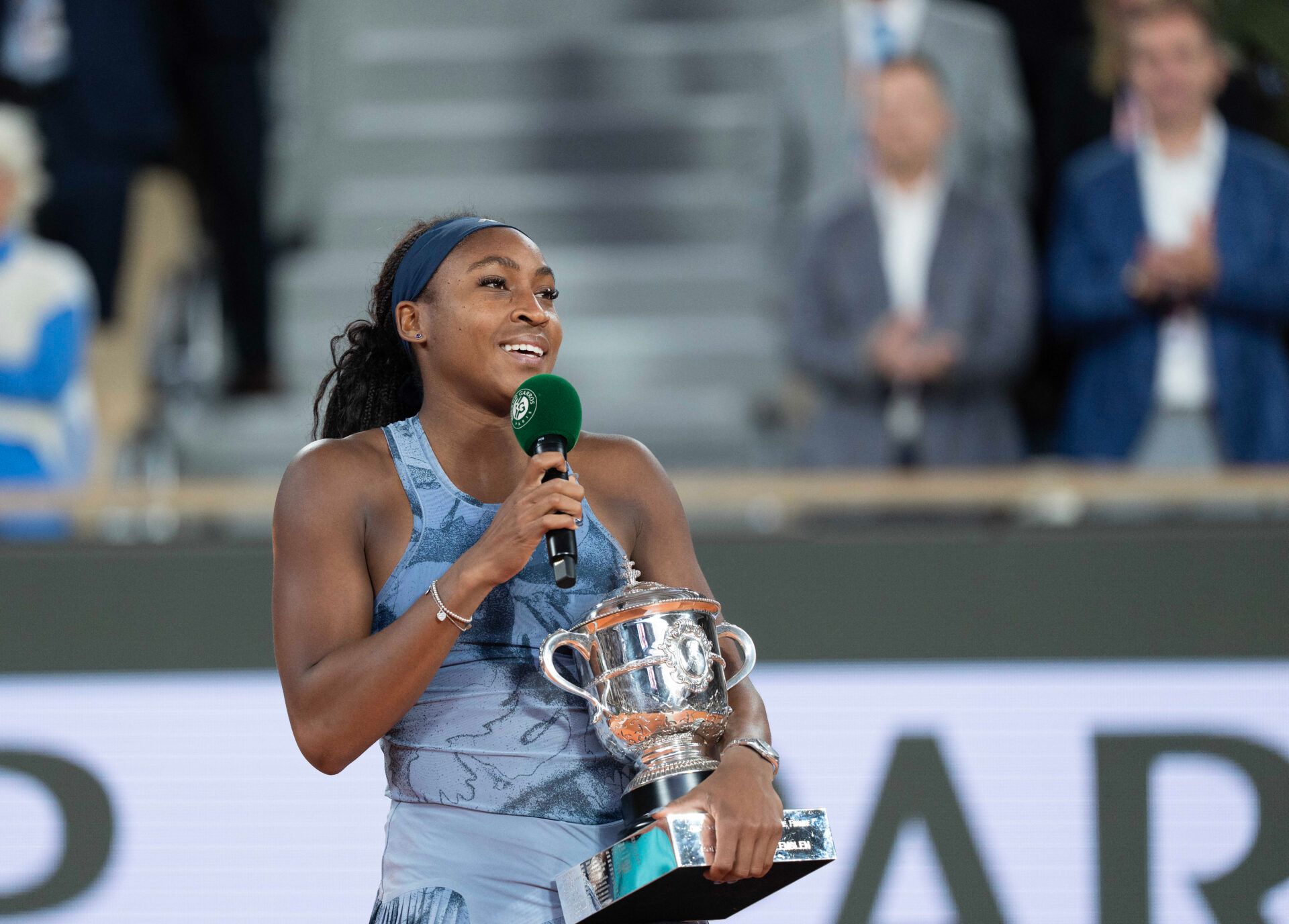 Coco Gauff of the United States at the trophy presentation after winning the womens singles final against Aryna Sabalenka on day 14 at Roland Garros Stadium.