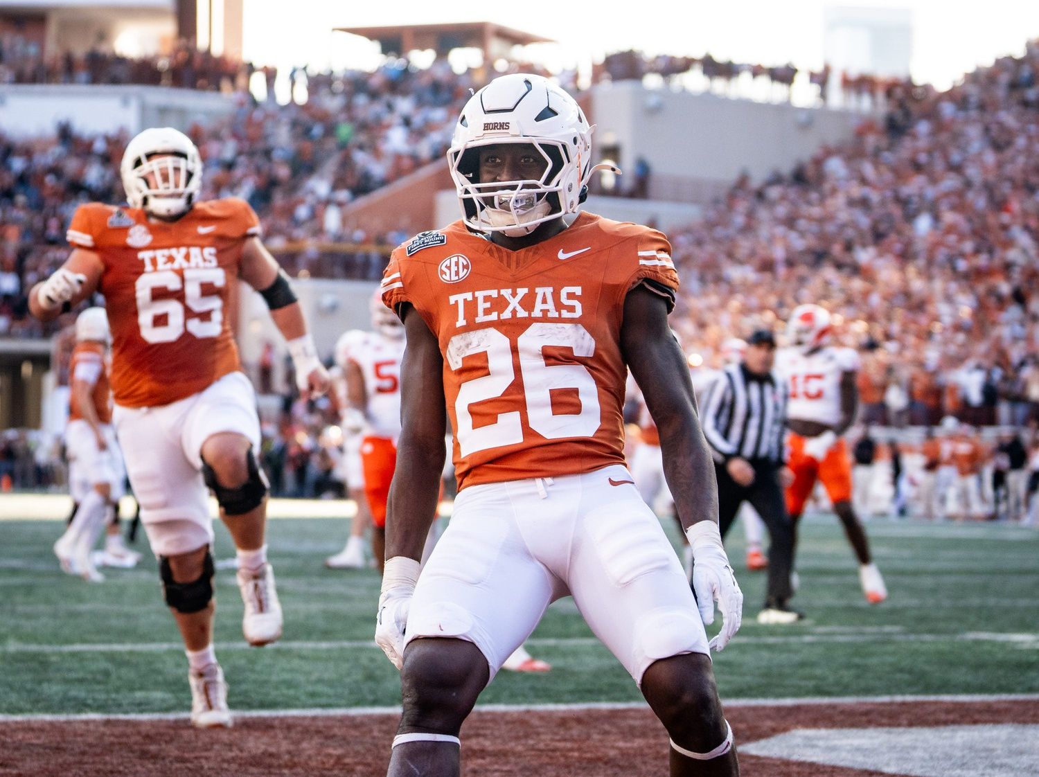 Texas Longhorns running back Quintrevion Wisner (26) celebrates scoring his second touchdown of the game in the second quarter as the Texas Longhorns play the Clemson Tigers in the first round of the College Football Playoffs at Darrell K Royal Texas Memorial Stadium in Austin, Texas, Dec. 21, 2024.