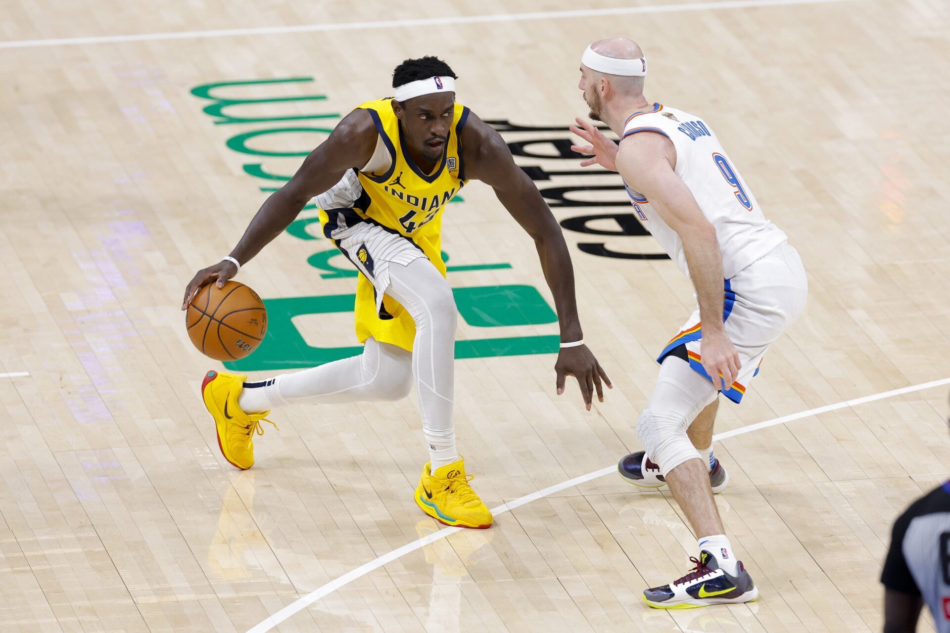 Indiana Pacers forward Pascal Siakam (43) looks to move the ball past Oklahoma City Thunder guard Alex Caruso (9) during the fourth quarter in game five of the 2025 NBA Finals at Paycom Center.
