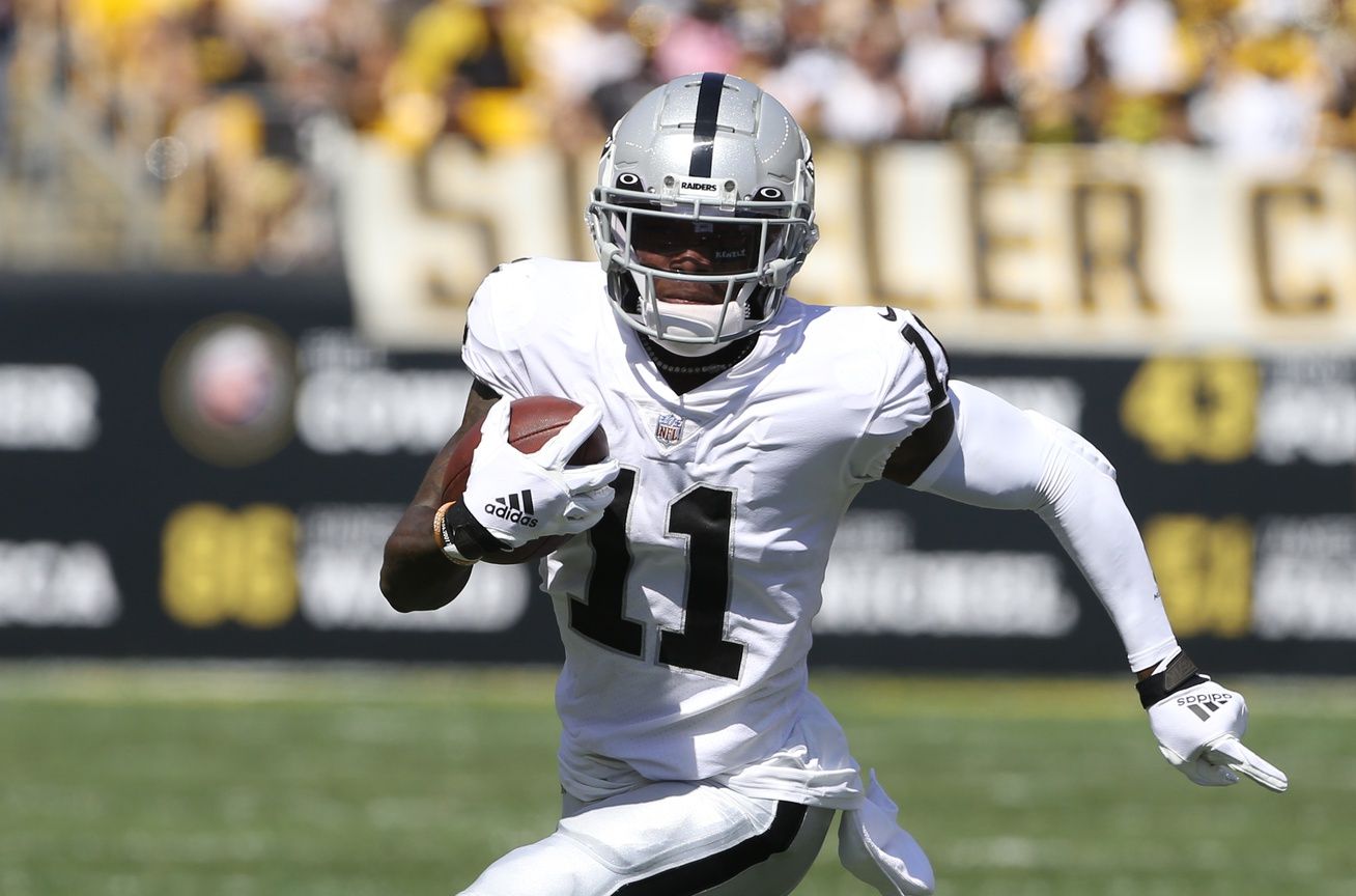 Las Vegas Raiders wide receiver Henry Ruggs III (11) runs after a catch against the Pittsburgh Steelers during the second quarter at Heinz Field.