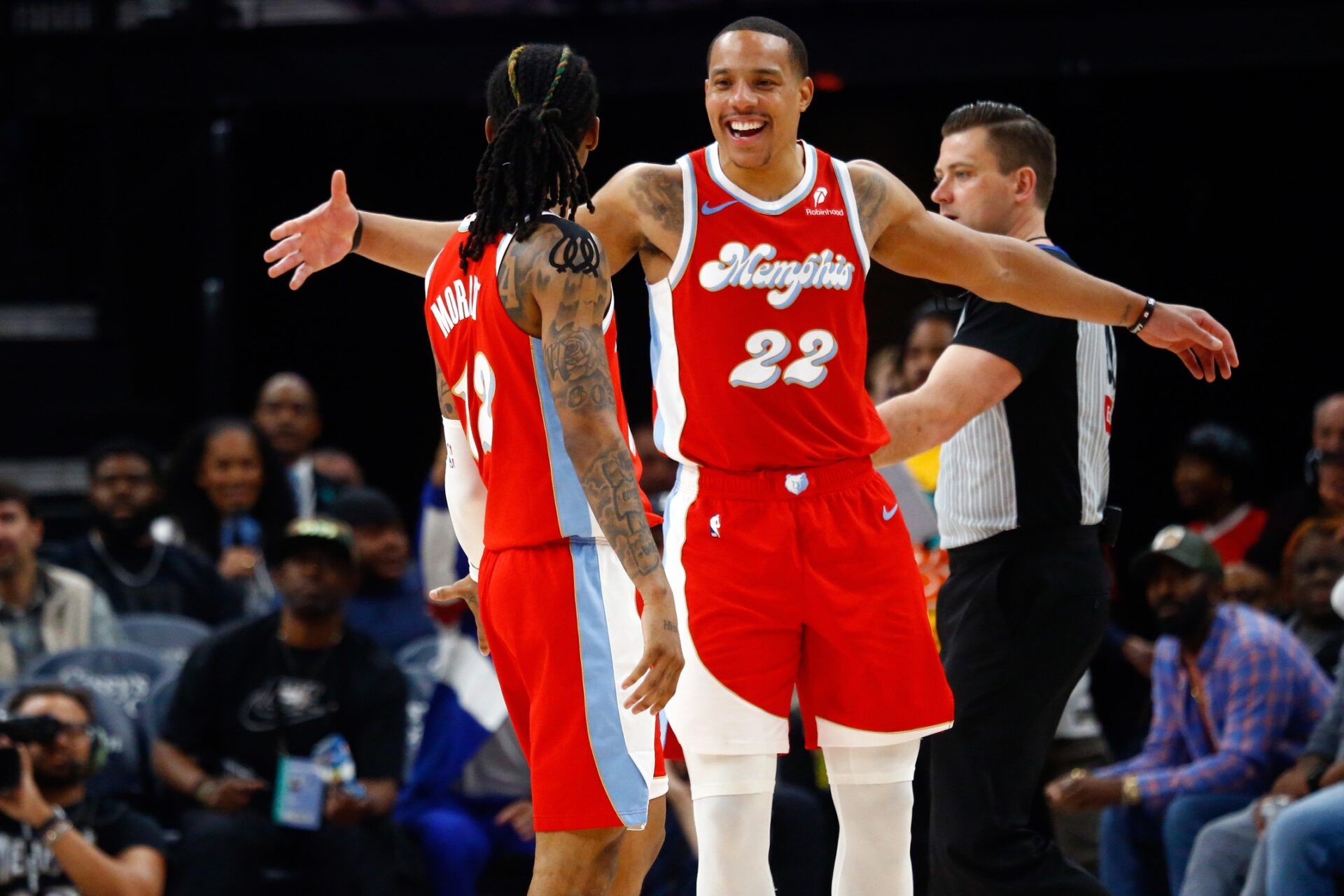 Memphis Grizzlies guard Desmond Bane (22) reacts with guard Ja Morant (12) during the third quarter against the Golden State Warriors at FedExForum.