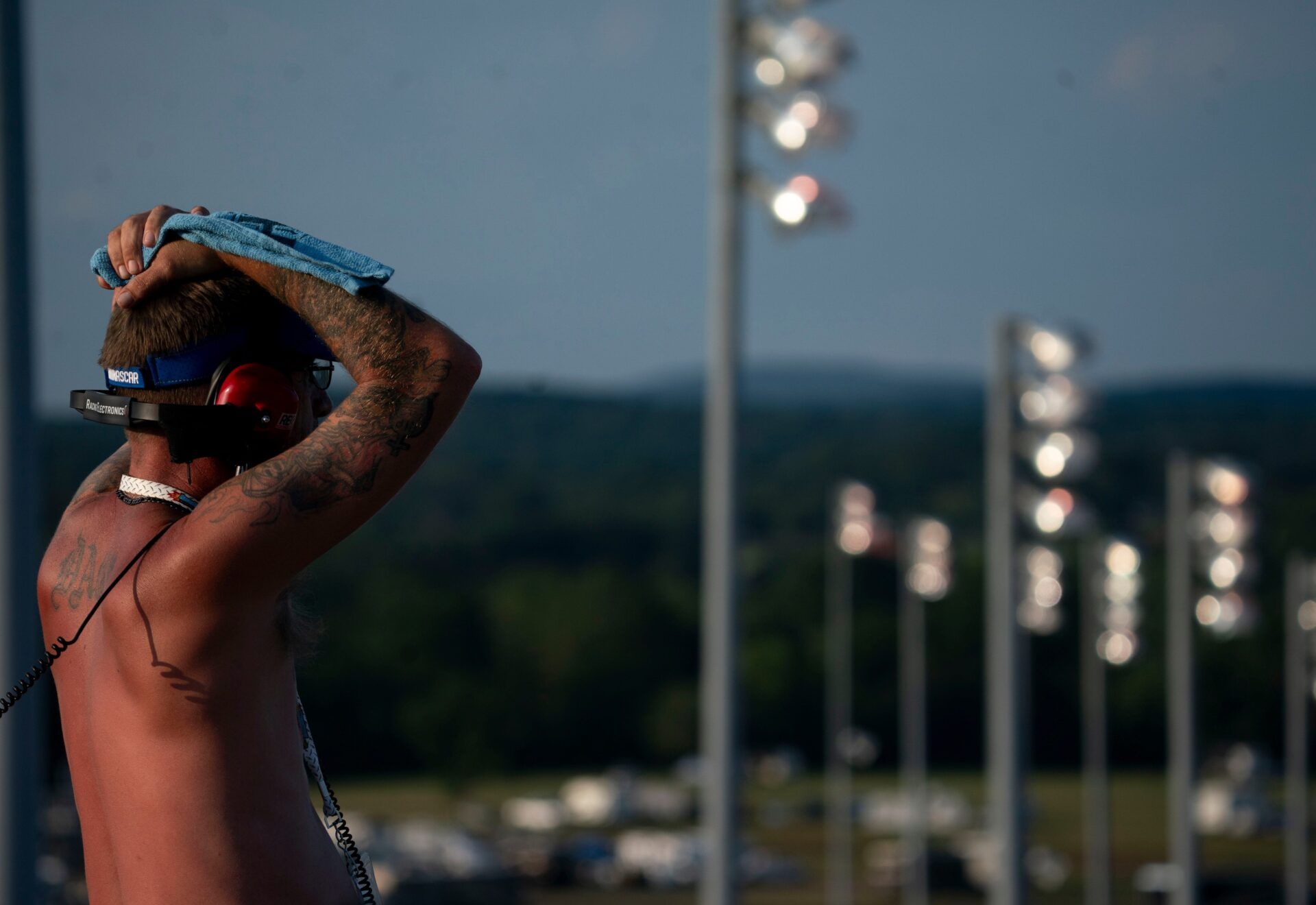 Donnie Loar of San Diego, Calif., reacts to NASCAR Cup Series driver Chase Elliott (9) losing control and skidding into the infield during the Ally 400 at Nashville Superspeedway in Lebanon, Tenn., Sunday, June 30, 2024. IMAGN
