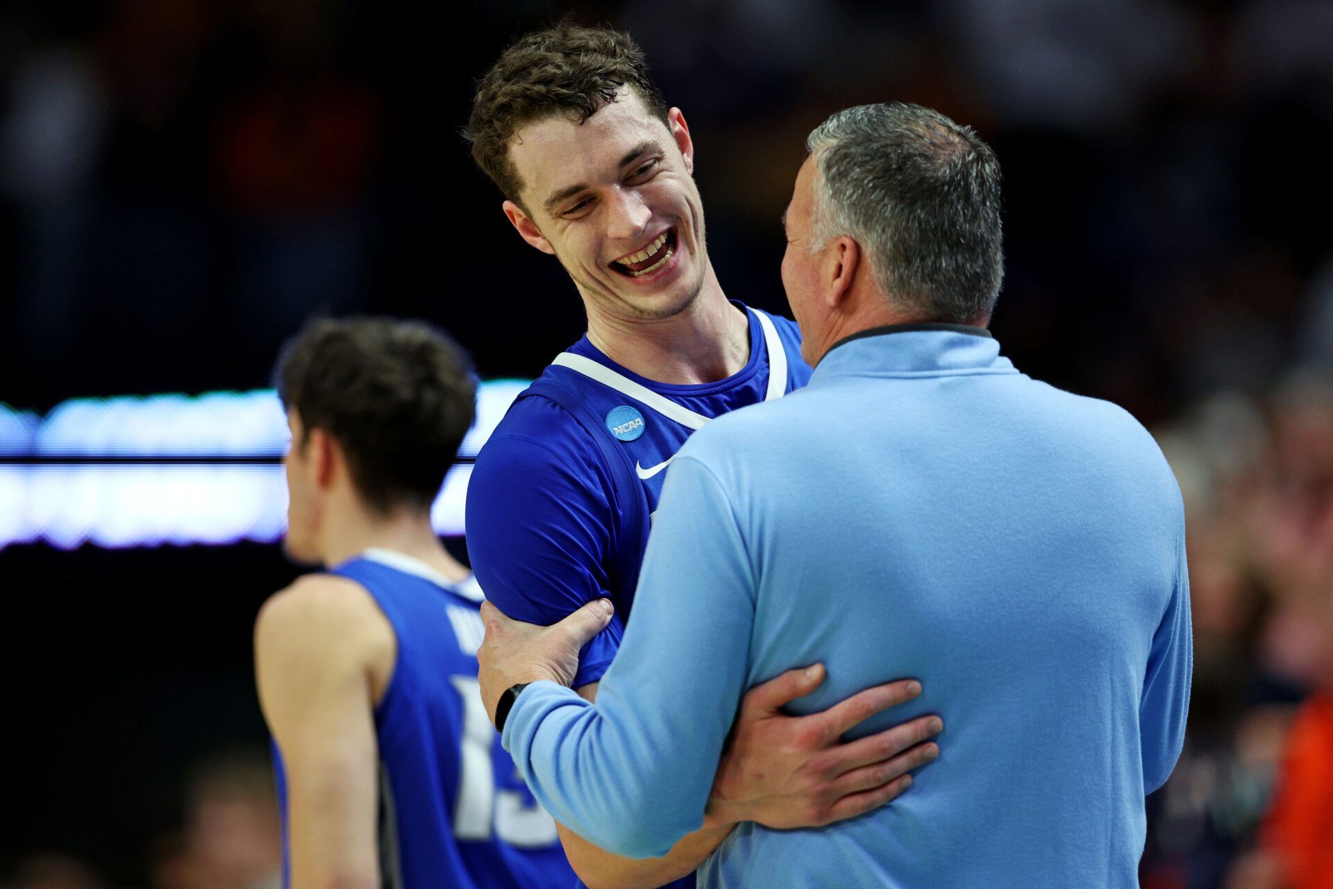 Creighton Bluejays center Ryan Kalkbrenner (11) reacts with head coach Greg McDermott during the second half against the Auburn Tigers in the second round to the NCAA Tournament at Rupp Arena.