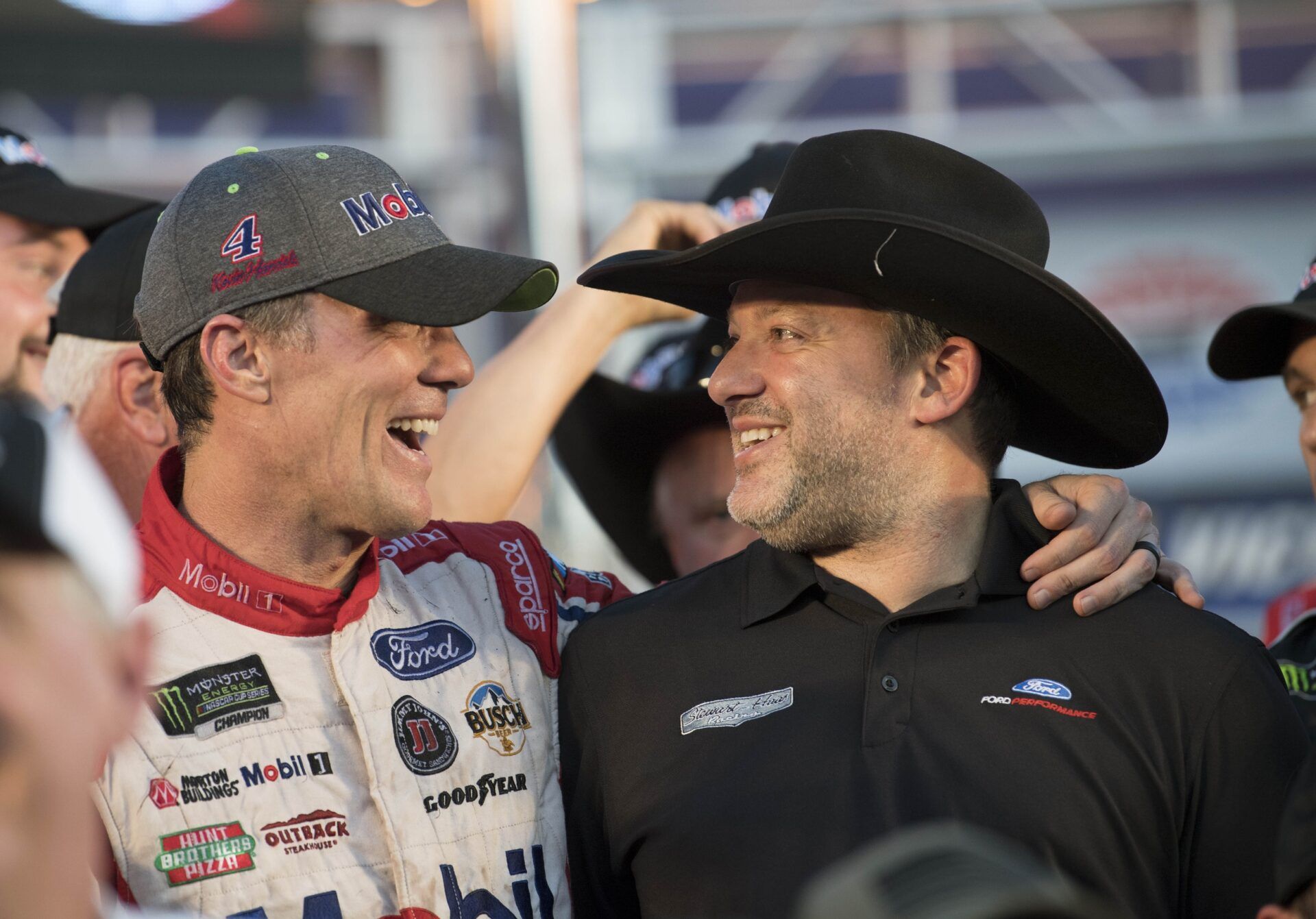 Monster Energy NASCAR Cup Series driver Kevin Harvick (left) celebrates with team owner Tony Stewart (right) after Harvick wins the AAA Texas 500 race at Texas Motor Speedway.