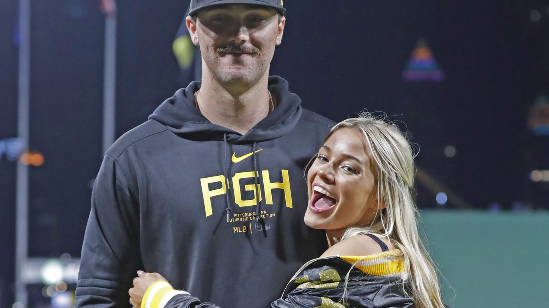 Pittsburgh Pirates starting pitcher Paul Skenes (30) poses with his girlfriend Louisiana State University gymnast Olivia Dunn (right) after making his major league debut against the Chicago Cubs at PNC Park. The Pirates won 10-8.
