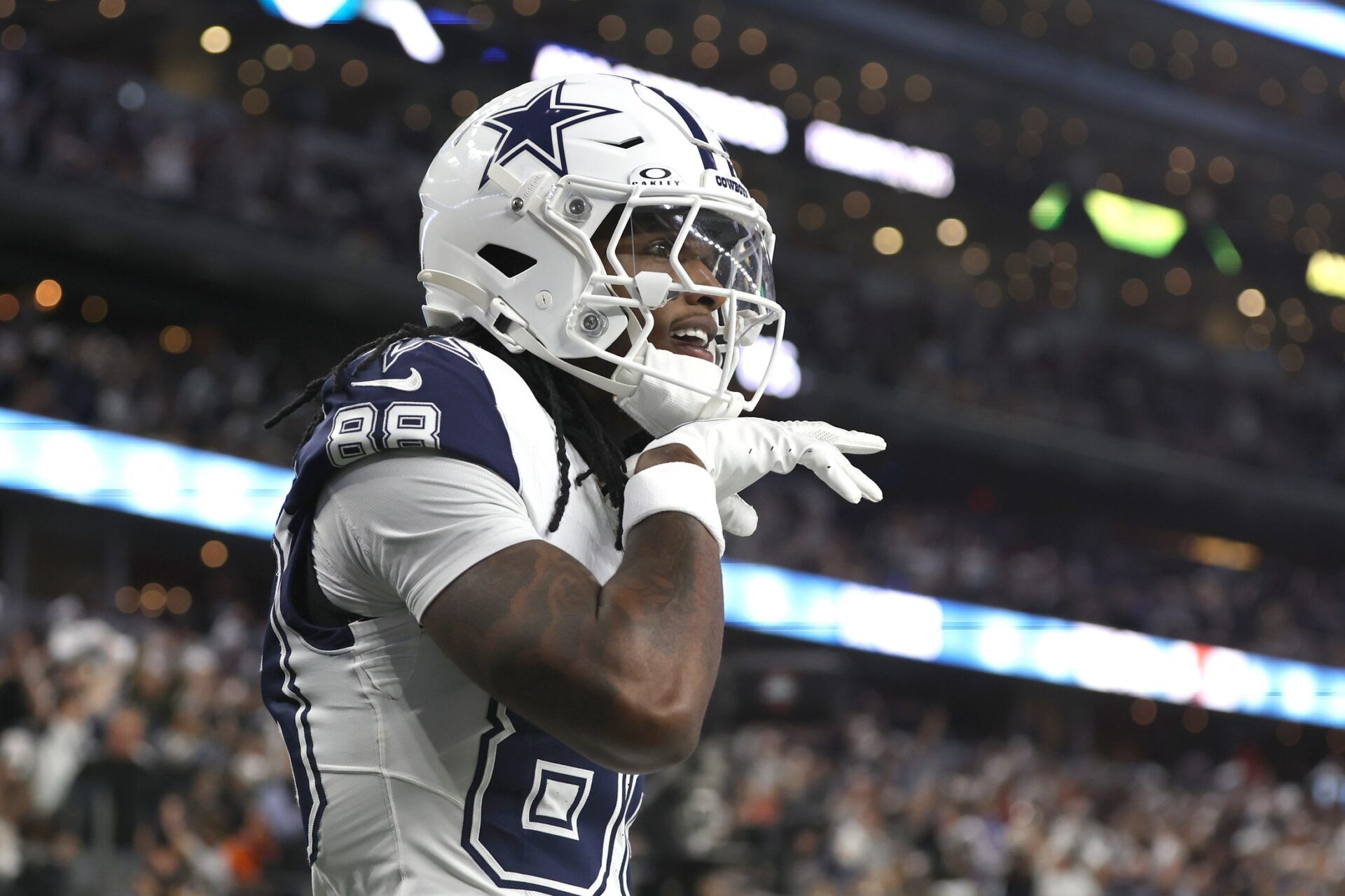 Dallas Cowboys wide receiver CeeDee Lamb (88) reacts after scoring a touchdown against the Cincinnati Bengals in the first quarter at AT&T Stadium.