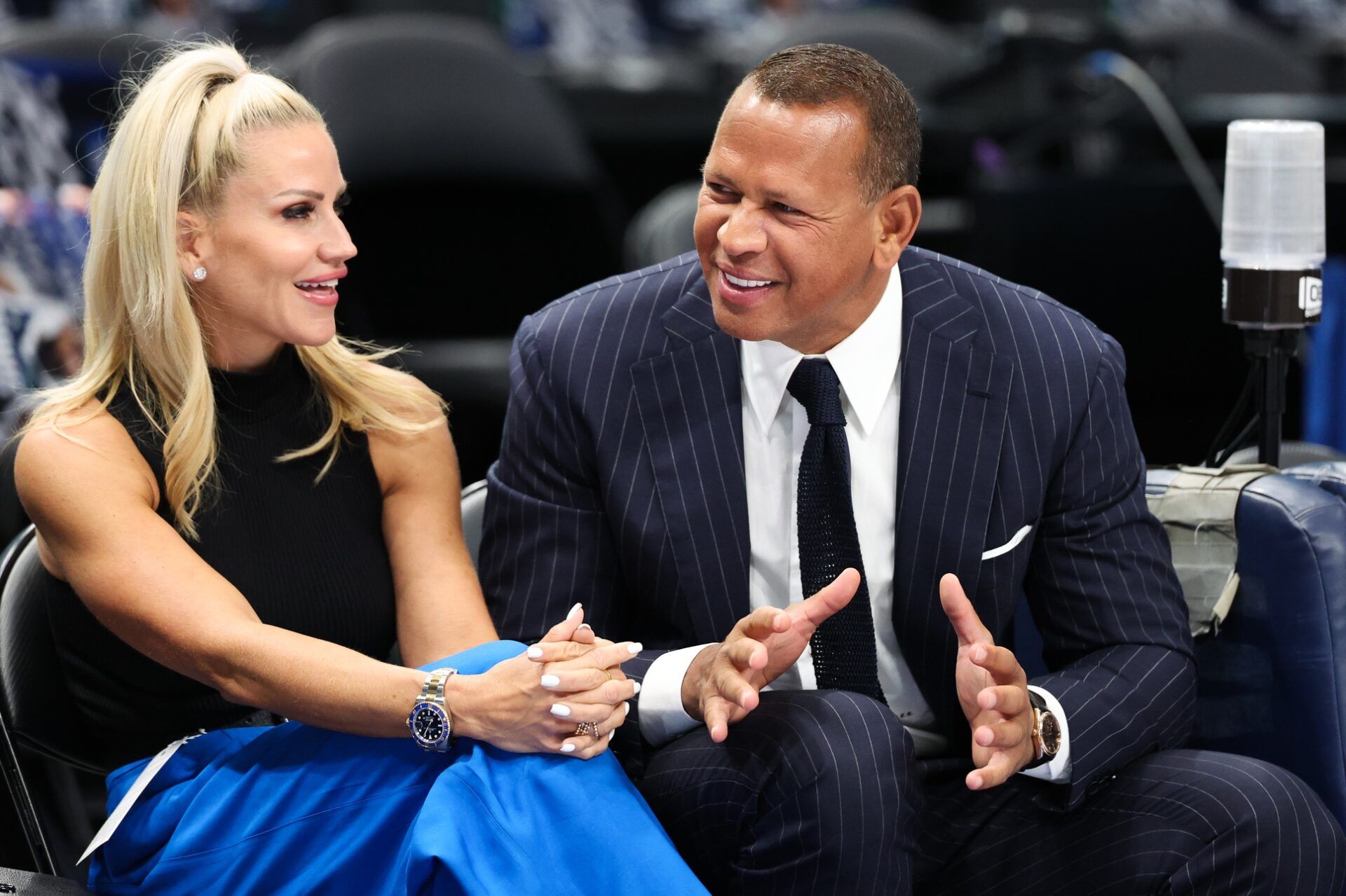 Jaclyn Cordeiro and Alex Rodriguez watch warm ups before game four of the western conference finals between the Dallas Mavericks and the Minnesota Timberwolves for the 2024 NBA playoffs at American Airlines Center.