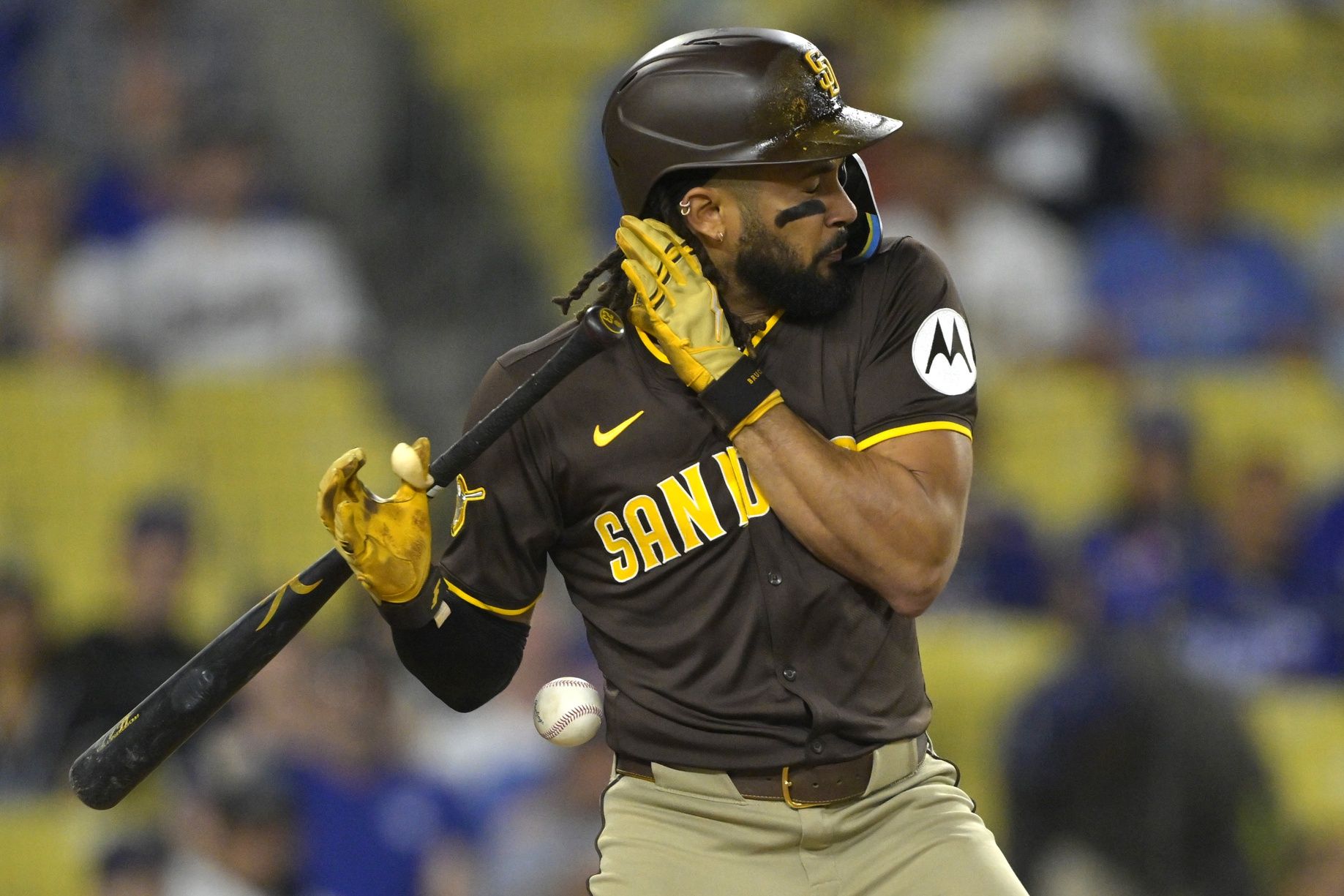 San Diego Padres right fielder Fernando Tatis Jr. (23) reacts as he is hit by a pitch in the eighth inning against the Los Angeles Dodgers at Dodger Stadium.