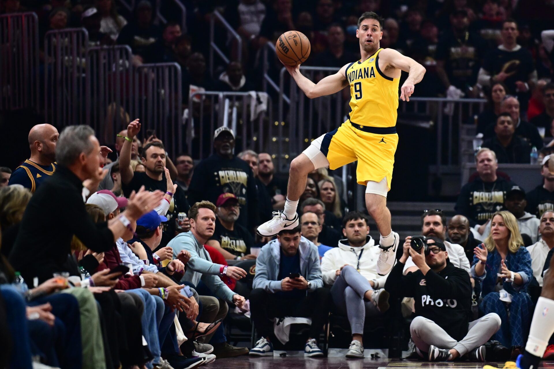 Indiana Pacers guard T.J. McConnell (9) saves the ball from going out of bounds during the first half against the Cleveland Cavaliers of game five of the second round for the 2025 NBA Playoffs at Rocket Arena.