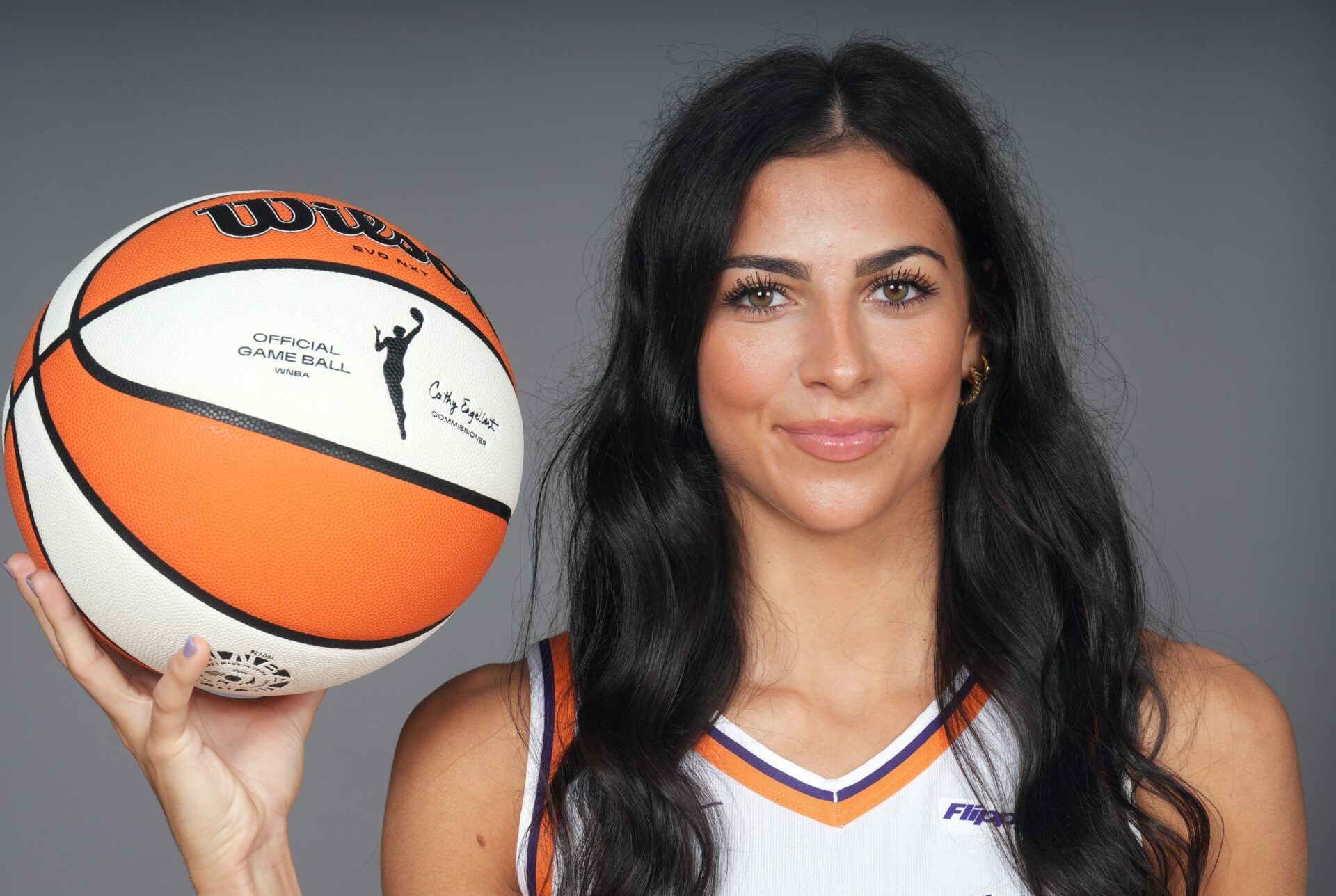 Phoenix Mercury player Megan McConnell (16) poses for a photo during Media Day