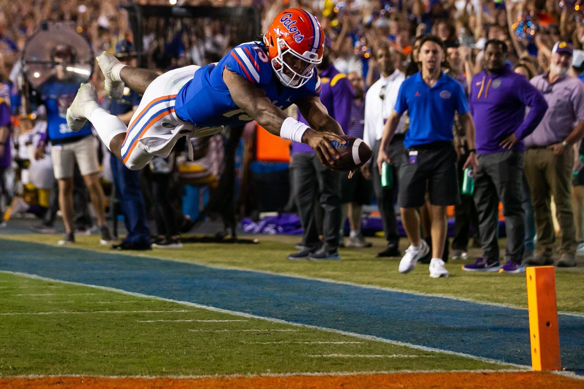Florida Gators quarterback Anthony Richardson (15) dives into the end zone for a touchdown in the second half against LSU at Steve Spurrier Field at Ben Hill Griffin Stadium in Gainesville, FL on Saturday, October 15, 2022. [Doug Engle/Gainesville Sun]

Ncaa Football Florida Gators Vs Lsu Tigers