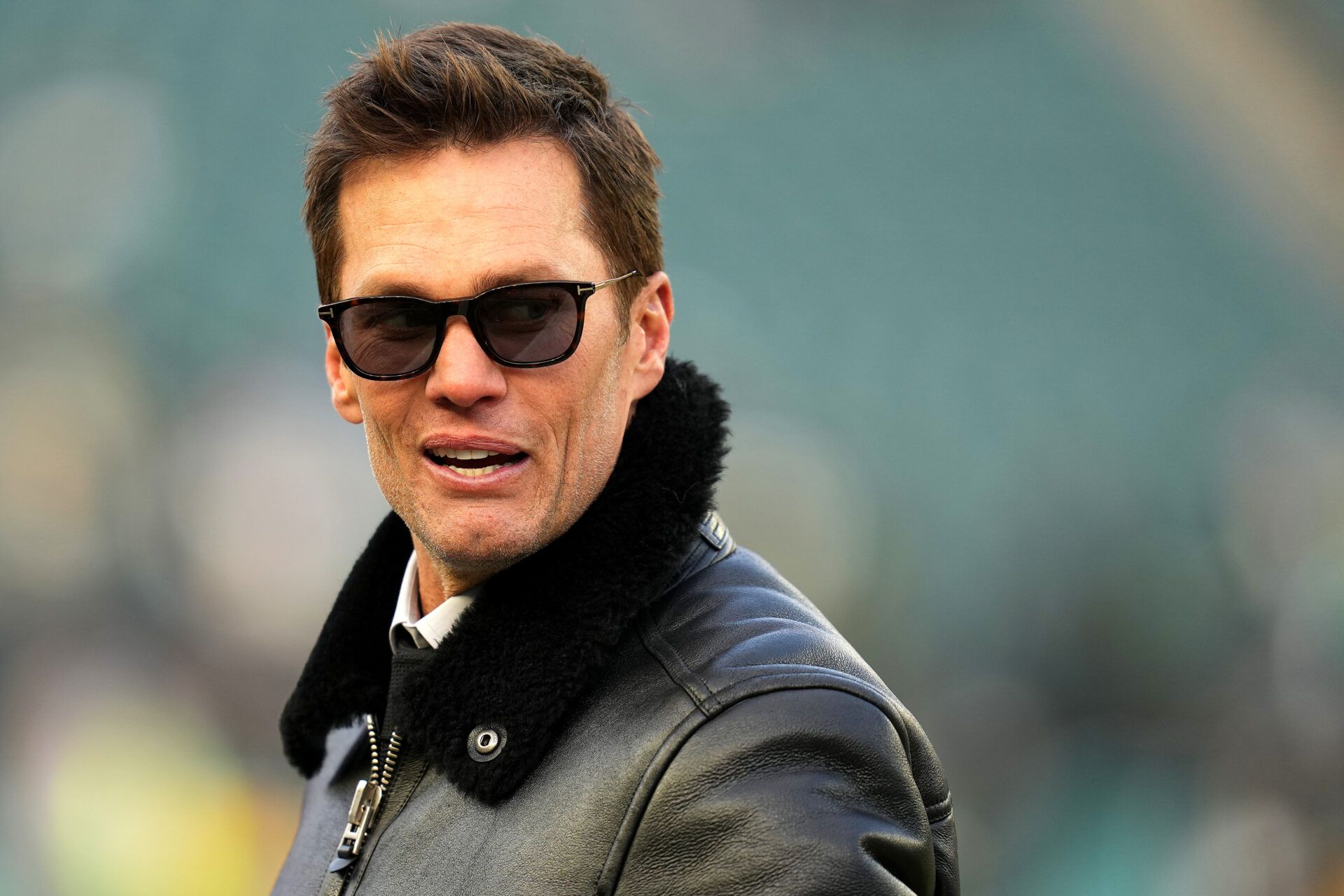 PHILADELPHIA, PENNSYLVANIA - JANUARY 12: Former NFL Player Tom Brady looks on prior to the NFC Wild Card Playoff between the Green Bay Packers and the Philadelphia Eagles at Lincoln Financial Field on January 12, 2025 in Philadelphia, Pennsylvania.  (Photo by Mitchell Leff/Getty Images)