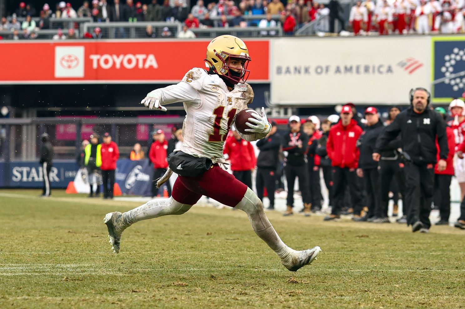 Boston College Eagles wide receiver Lewis Bond (11)  gains yards after catch during the second half against the Nebraska Cornhuskers at Yankee Stadium.