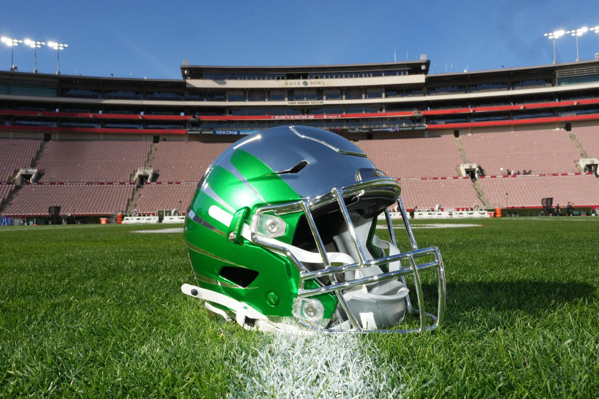 An Oregon Ducks helmet on the field at Rose Bowl Stadium.
