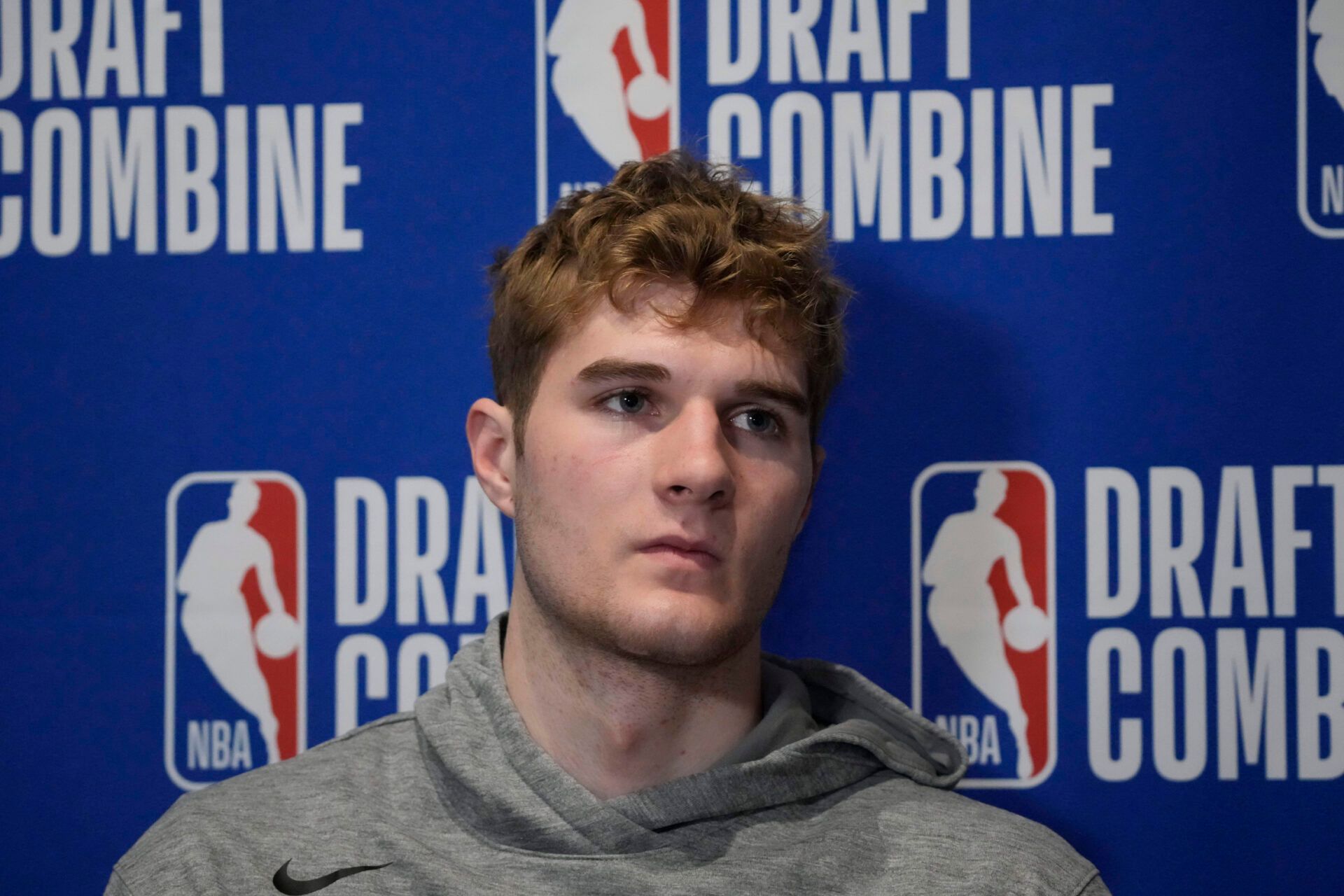 Liam McNeeley talks to the media during the 2025 NBA Draft Combine at Marriott Marquis Chicago.