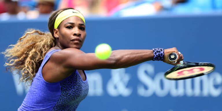 Serena Williams, the number 1 seed for the Western and Southern Open beat Samantha Stosur on Center Court at the Lindner Family Tennis Center. Williams won 7-6(7), 7-6(7) Wednesday. Photo shot Wednesday August 13, 2014. The Enquirer/Cara Owsley