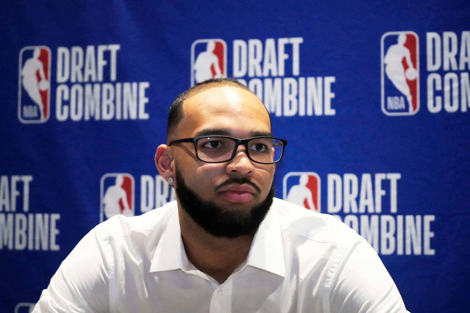Johni Broome talks to the media during the 2025 NBA Draft Combine at Marriott Marquis Chicago.