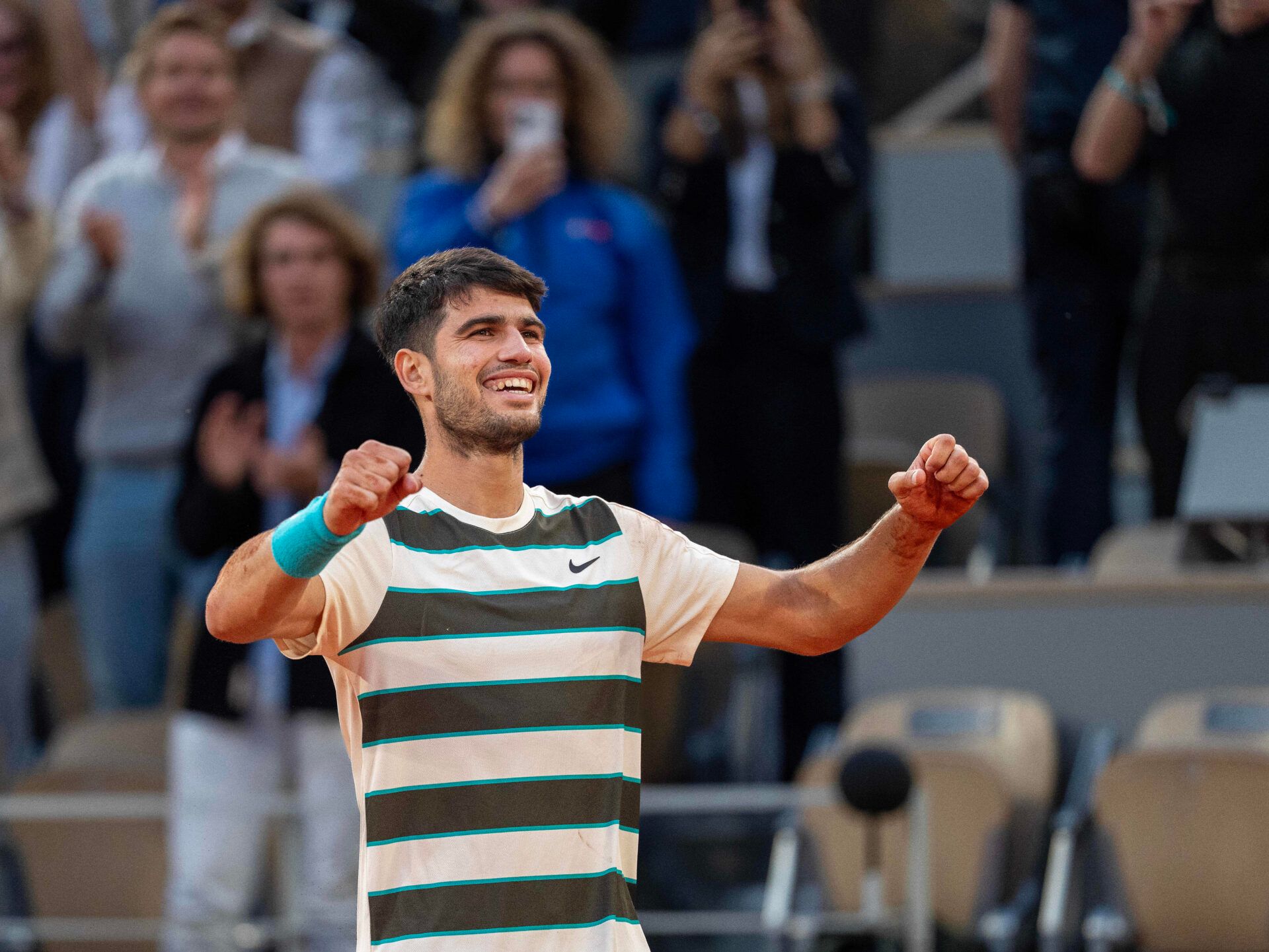 Carlos Alcaraz of Spain celebrates winning the men’s singles final against Jannik Sinner of Italy on day 15 at Roland Garros Stadium.