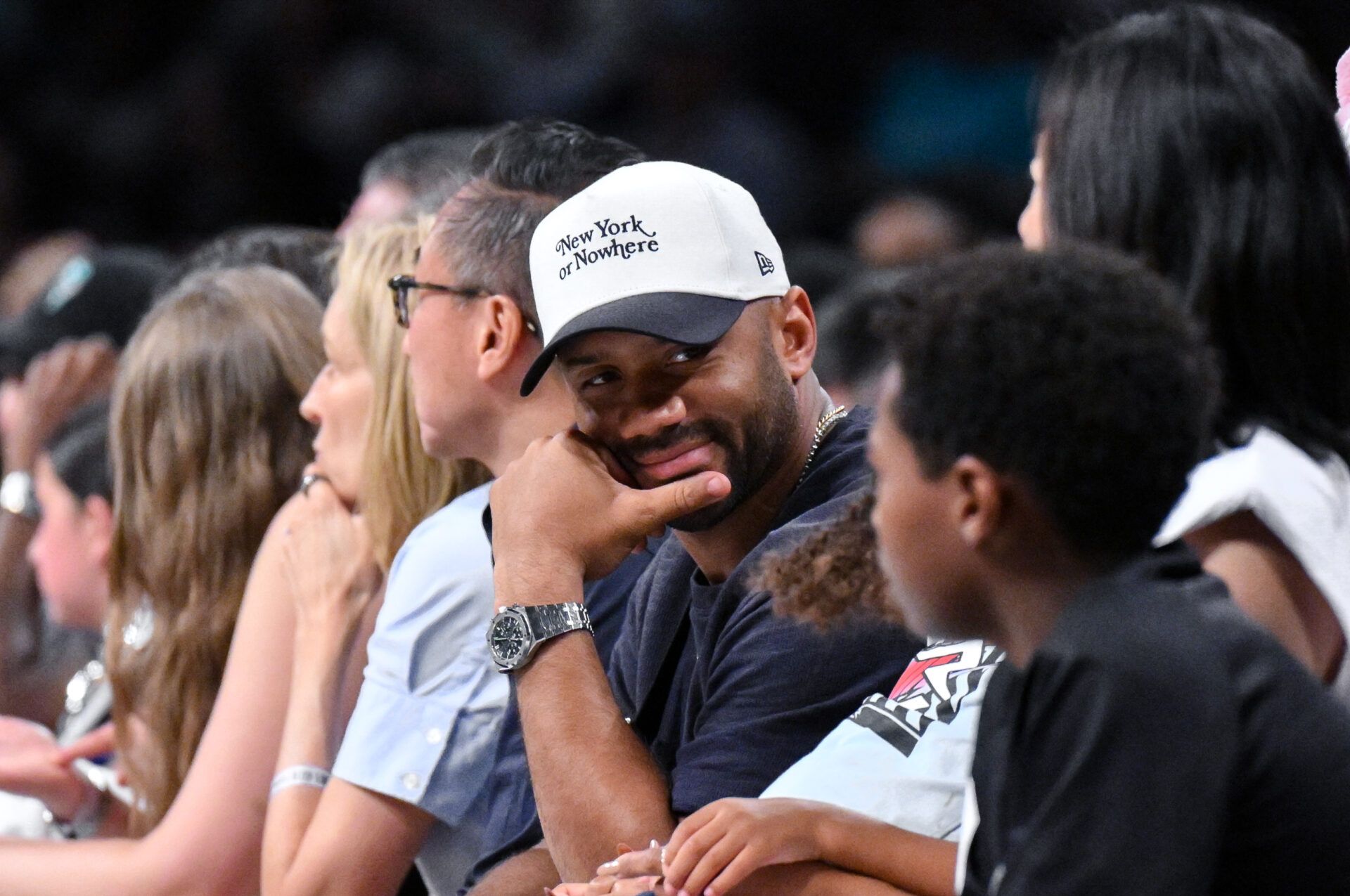 New York Giants quarterback Russell Wilson looks on during the second half of a game between the New York Liberty and the Phoenix Mercury at Barclays Center.